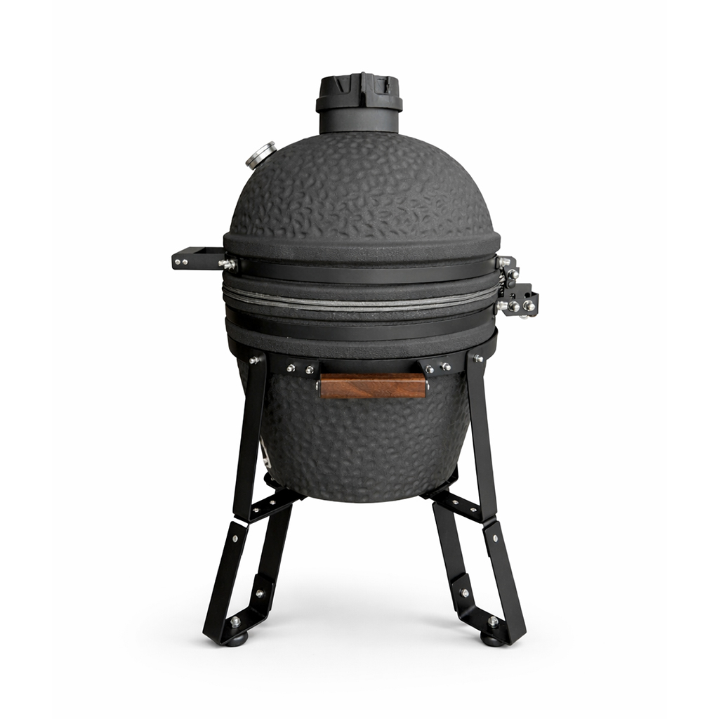 Ein schwarzer Keramikgrill mit Deckel, Griffen und Metallbeinen.
