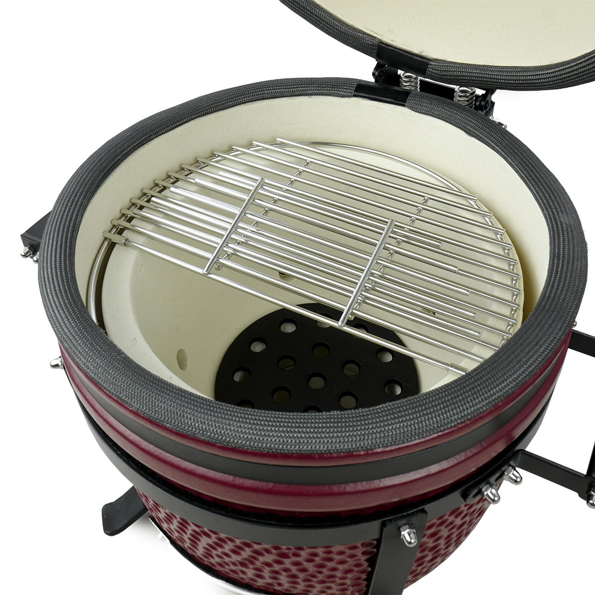 Ein offener, burgunderfarbener Keramikgrill mit einem Metallrost.