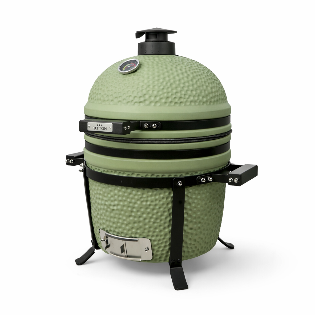 Ein hellgrüner Keramikgrill mit schwarzem Gestell und Thermometer.