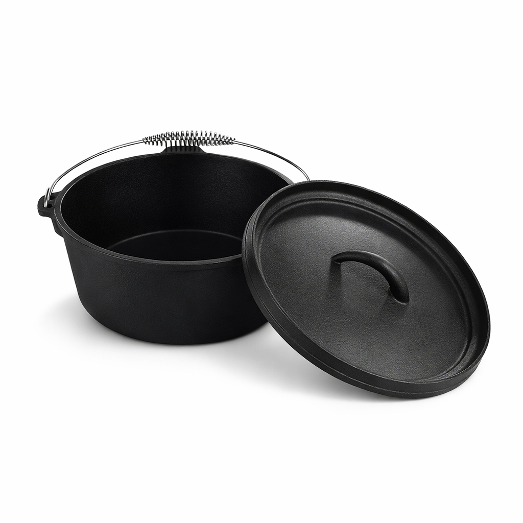 Black cast iron pot with handle and detached lid on a white background.