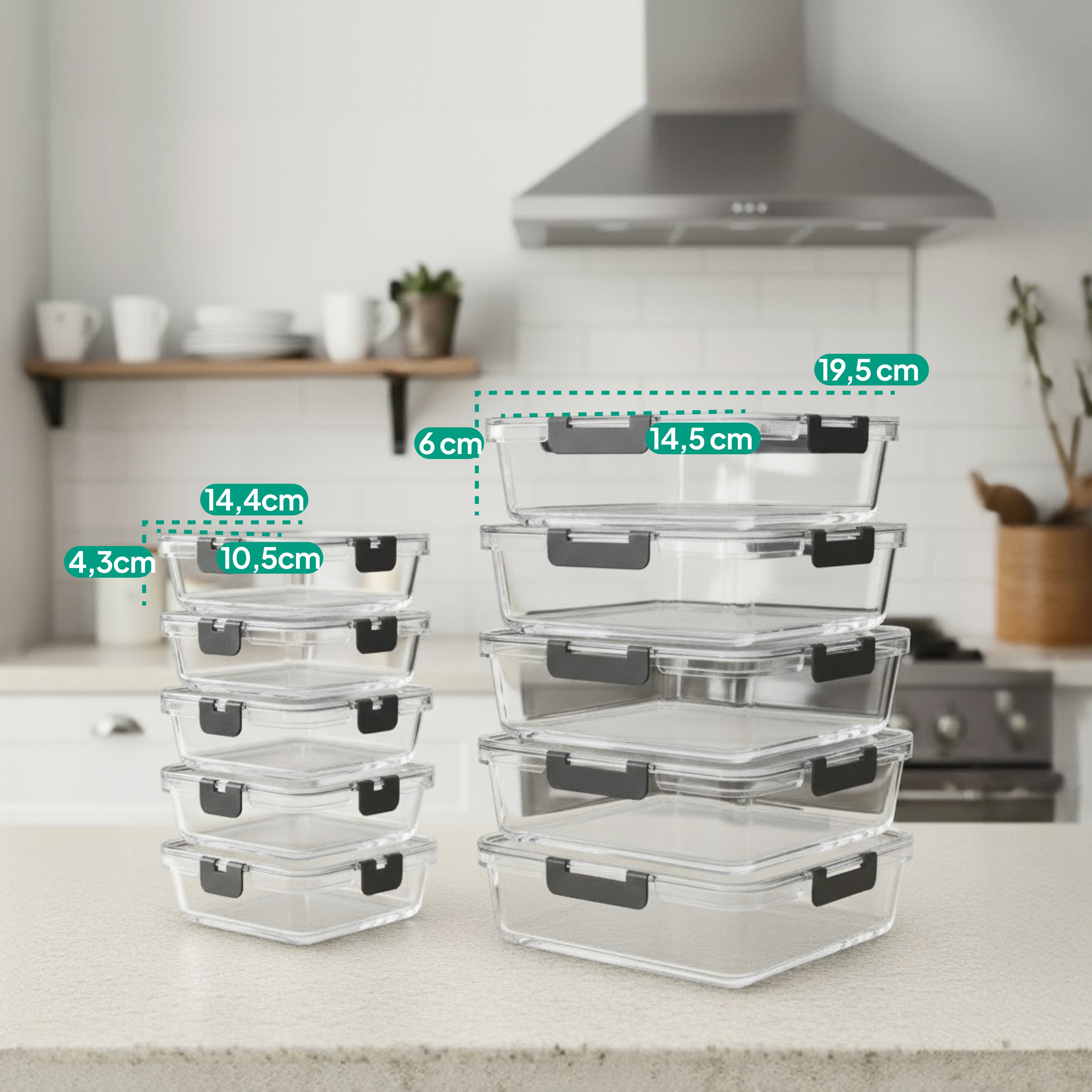 Multiple clear glass food containers with black clasps are stacked.