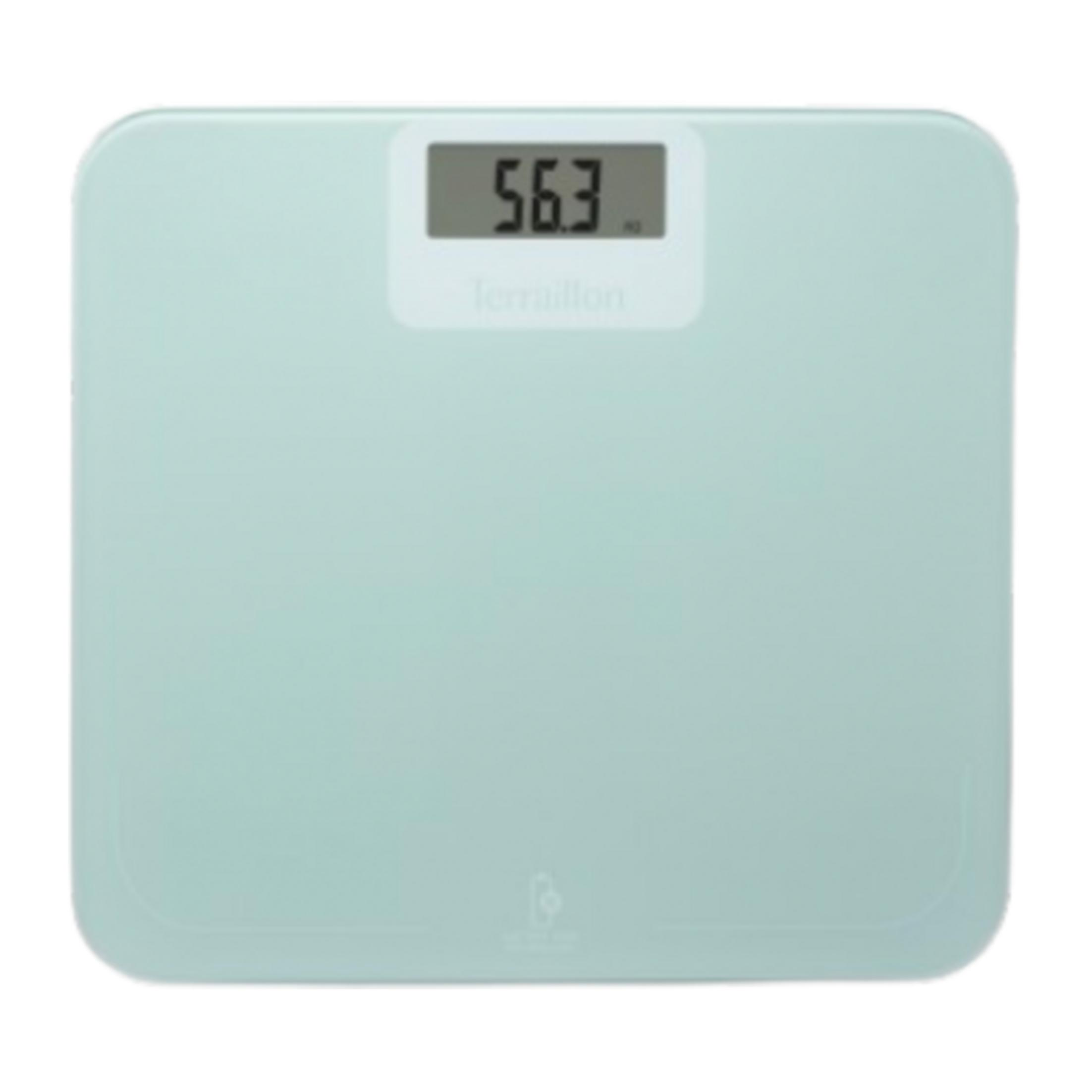 Eine hellgrüne Waage mit digitaler Anzeige von 56,3 kg.