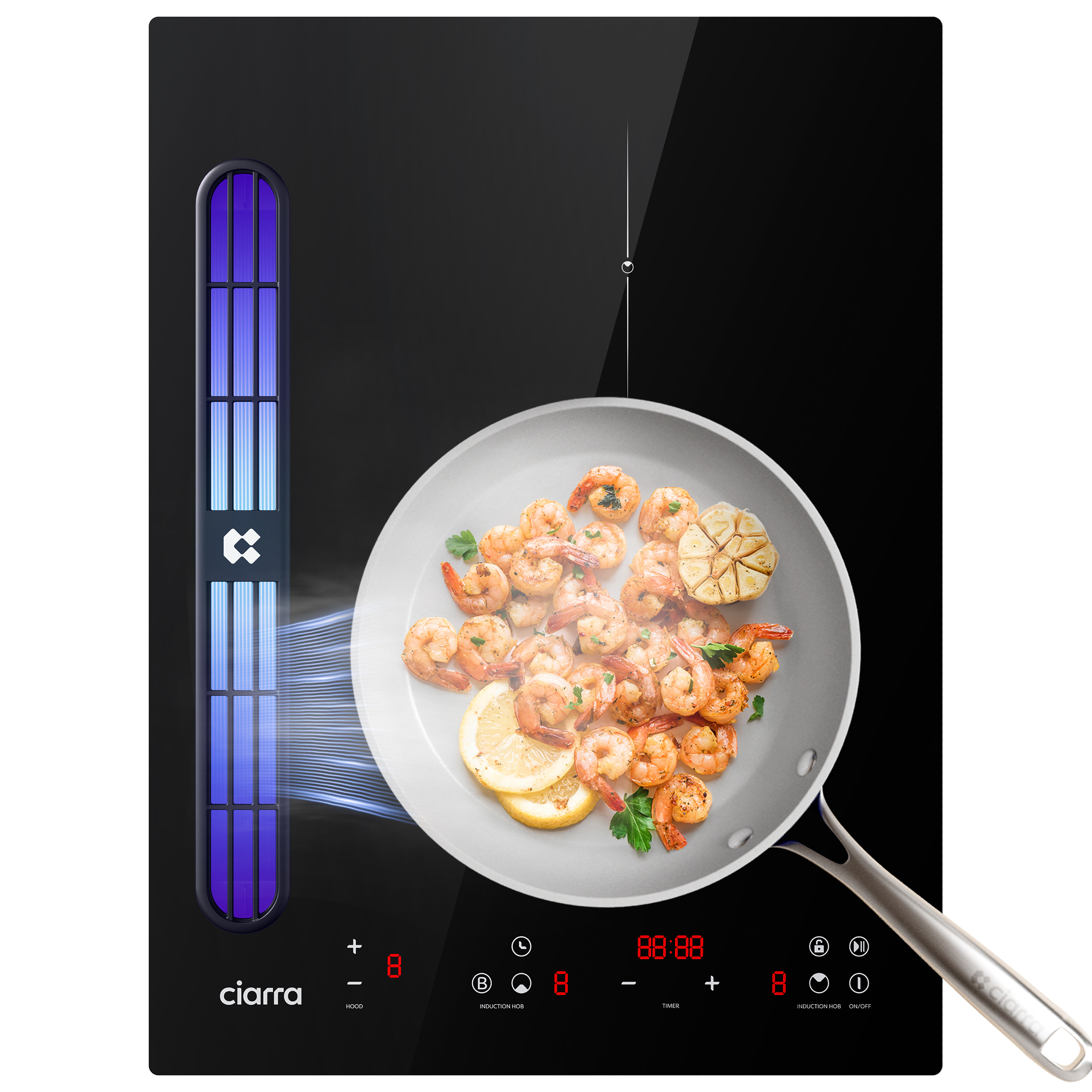 A black induction cooktop with a pan of shrimp and lemon slices.