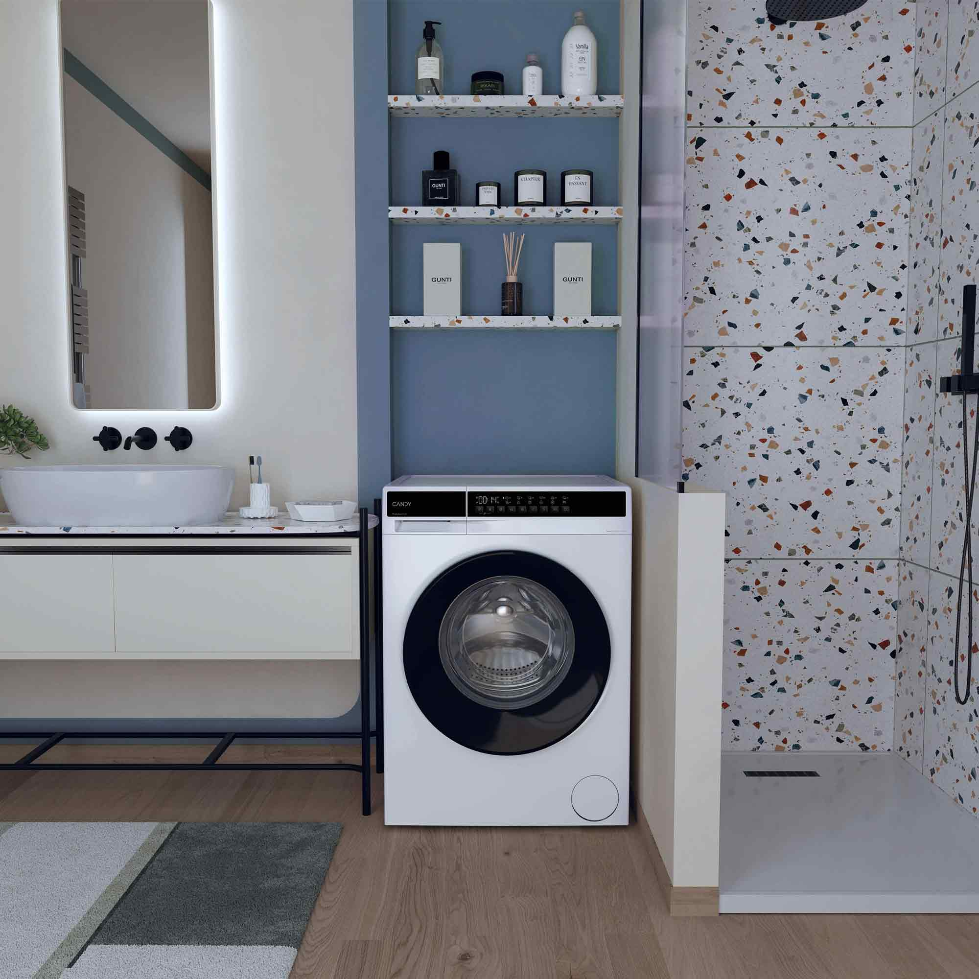 Bagno moderno con lavatrice, lavabo e box doccia con piastrelle in terrazzo.