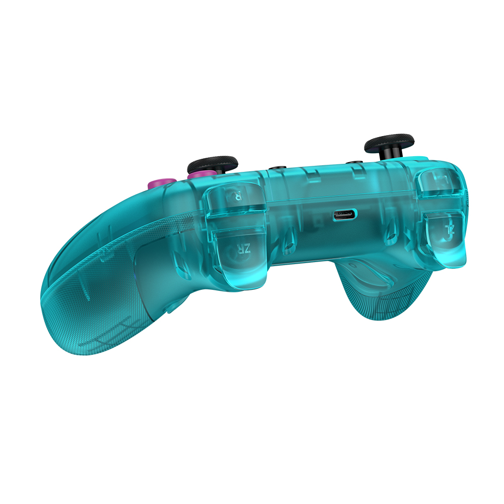 Ein durchsichtiger türkisfarbener Controller mit schwarzen und pinken Knöpfen.