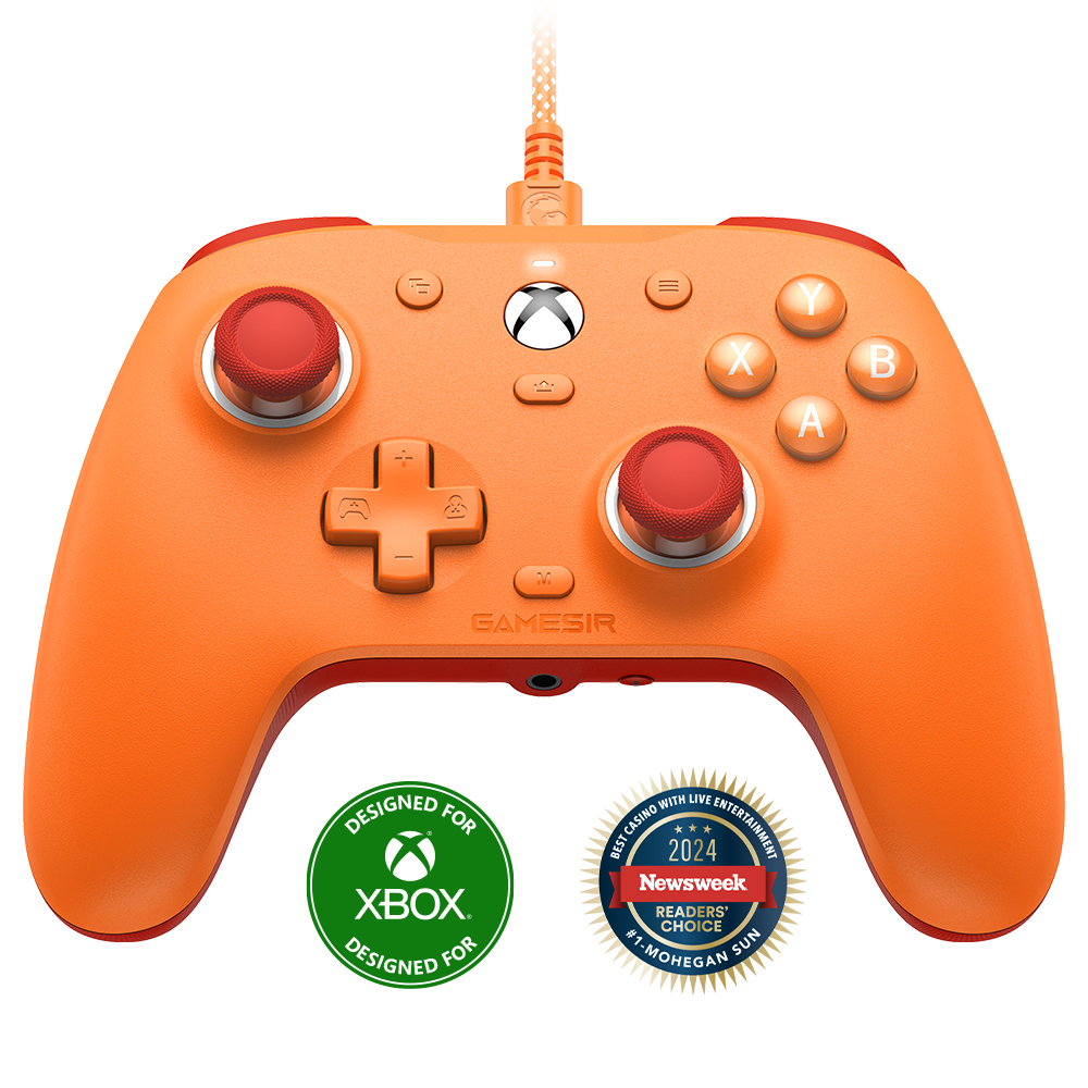 Un controller Xbox arancione con accenti rossi e due adesivi.