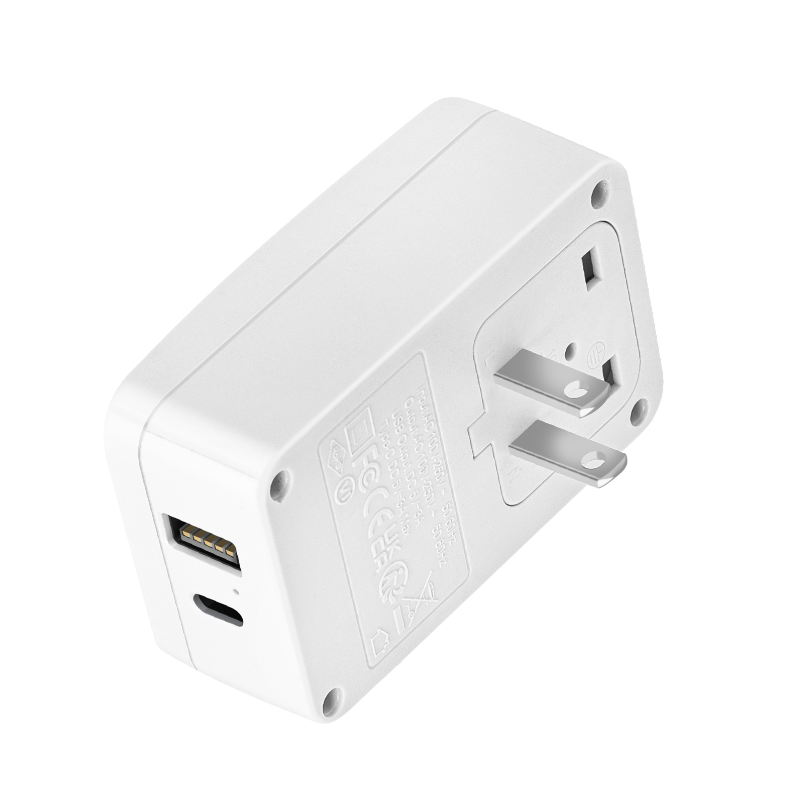 Adattatore da viaggio bianco con USB-A, USB-C e spina AC.