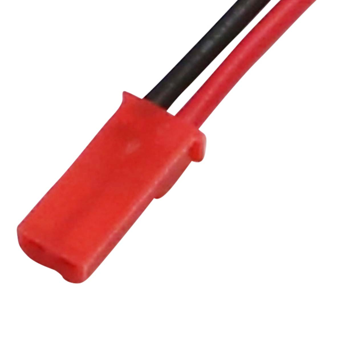 Un connettore rosso con cavi nero e rosso.