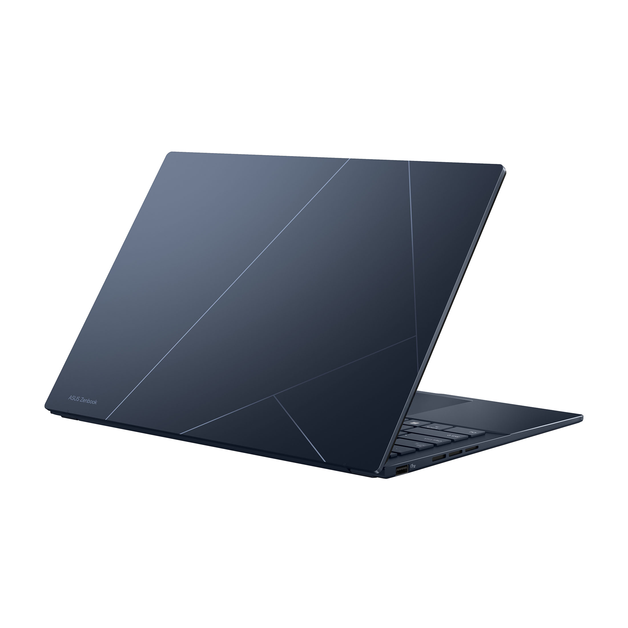 Ein dunkelblauer Asus Zenbook Laptop, teilweise geöffnet, mit geometrischem Muster.
