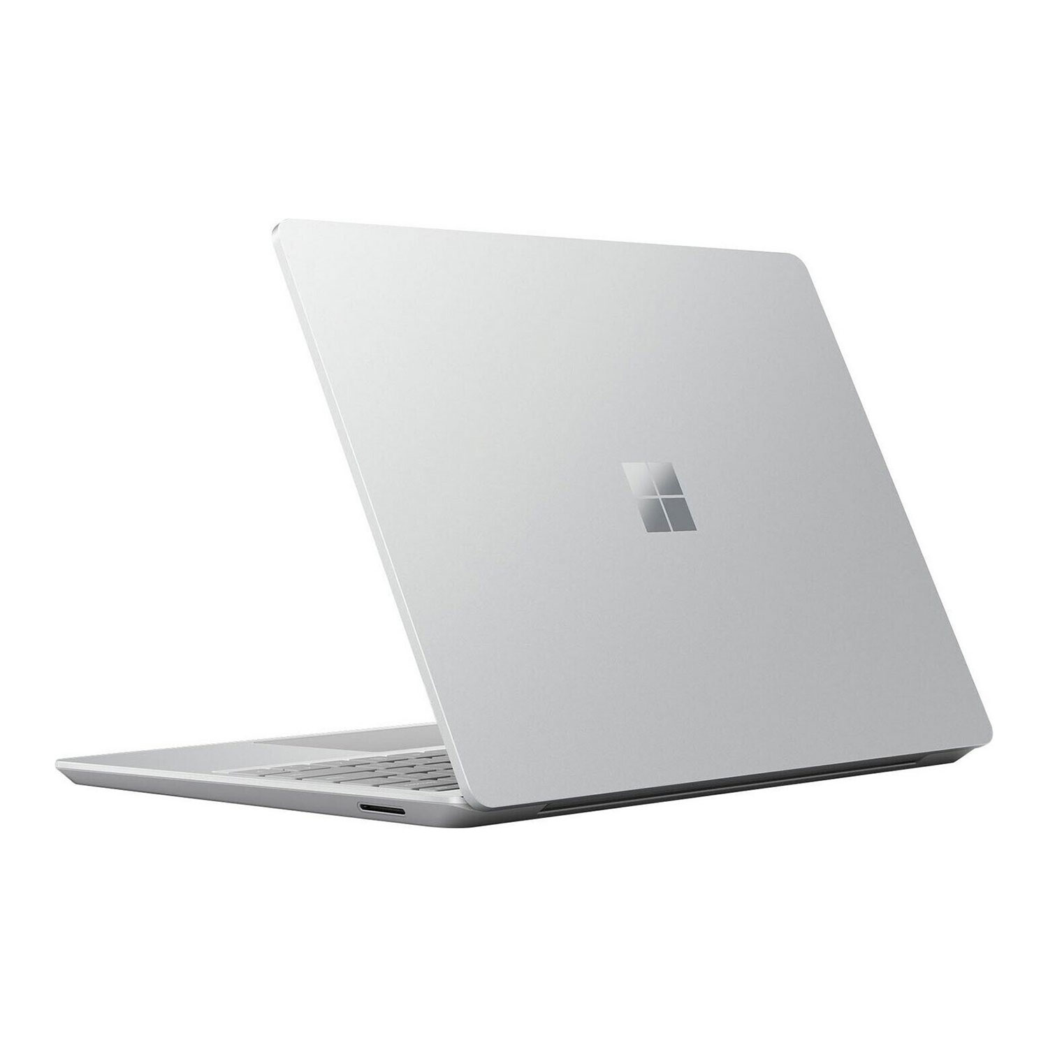 Ein geöffneter silberner Laptop mit dem Microsoft-Logo auf dem Deckel.