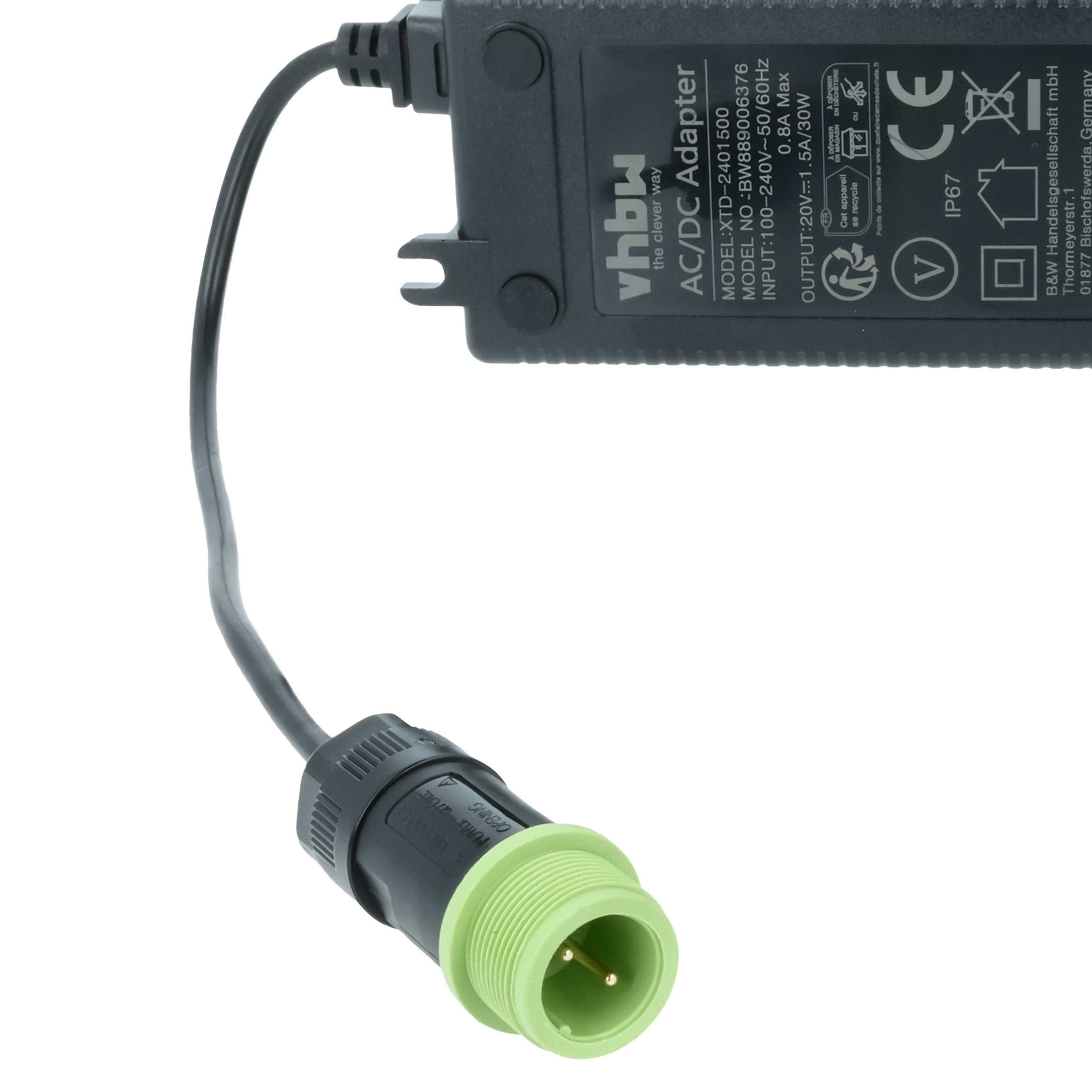 Schwarzer AC/DC-Adapter mit Kabel und grünem Stecker. Details auf dem Gehäuse.