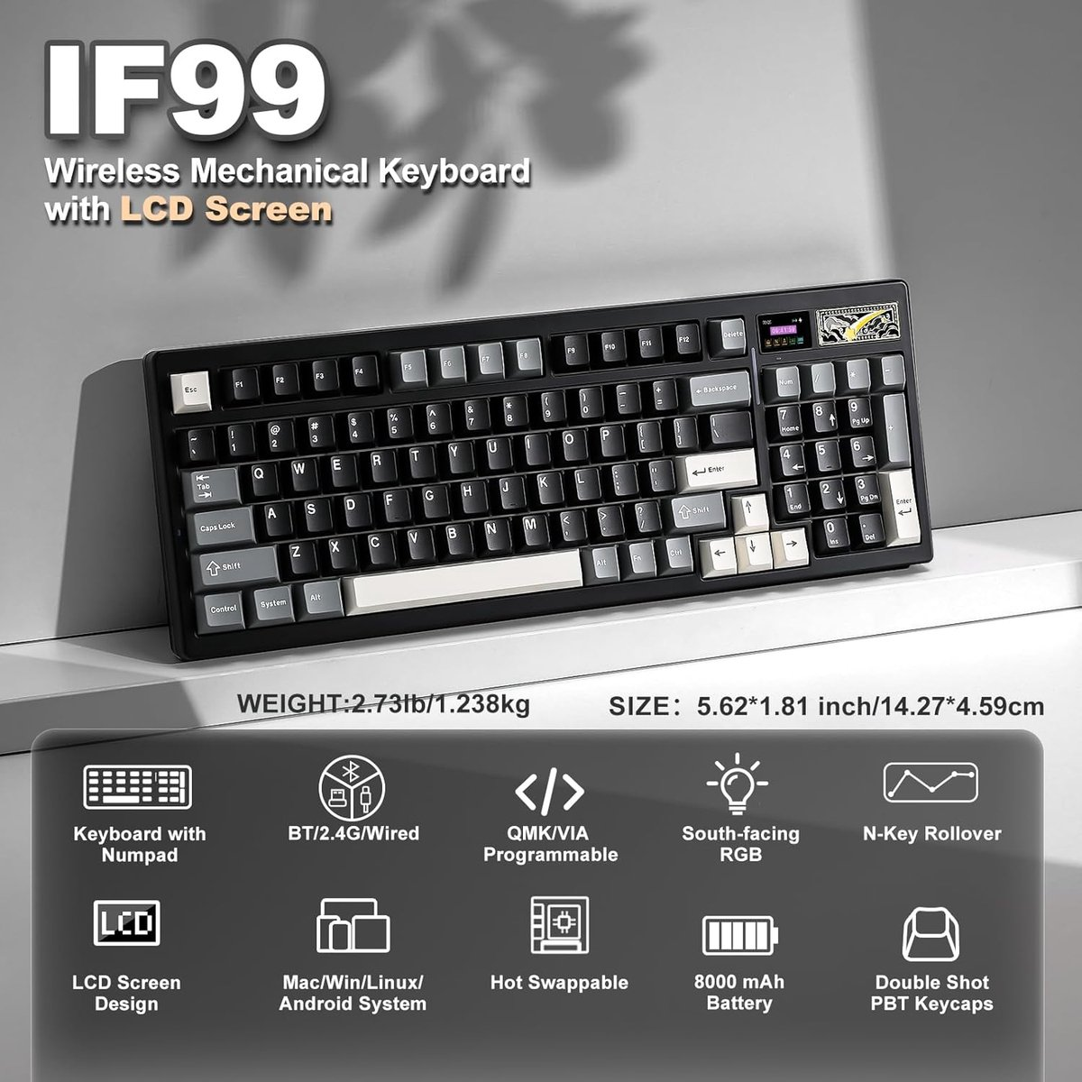 Clavier mécanique noir avec pavé numérique et écran LCD.