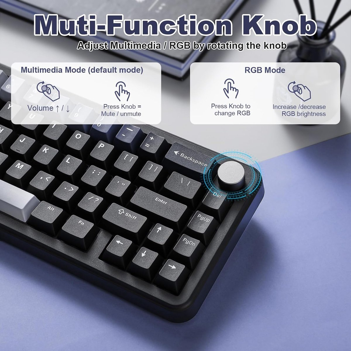 Zwart toetsenbord met zilveren multifunctionele knop. Instructies voor multimedia en RGB.