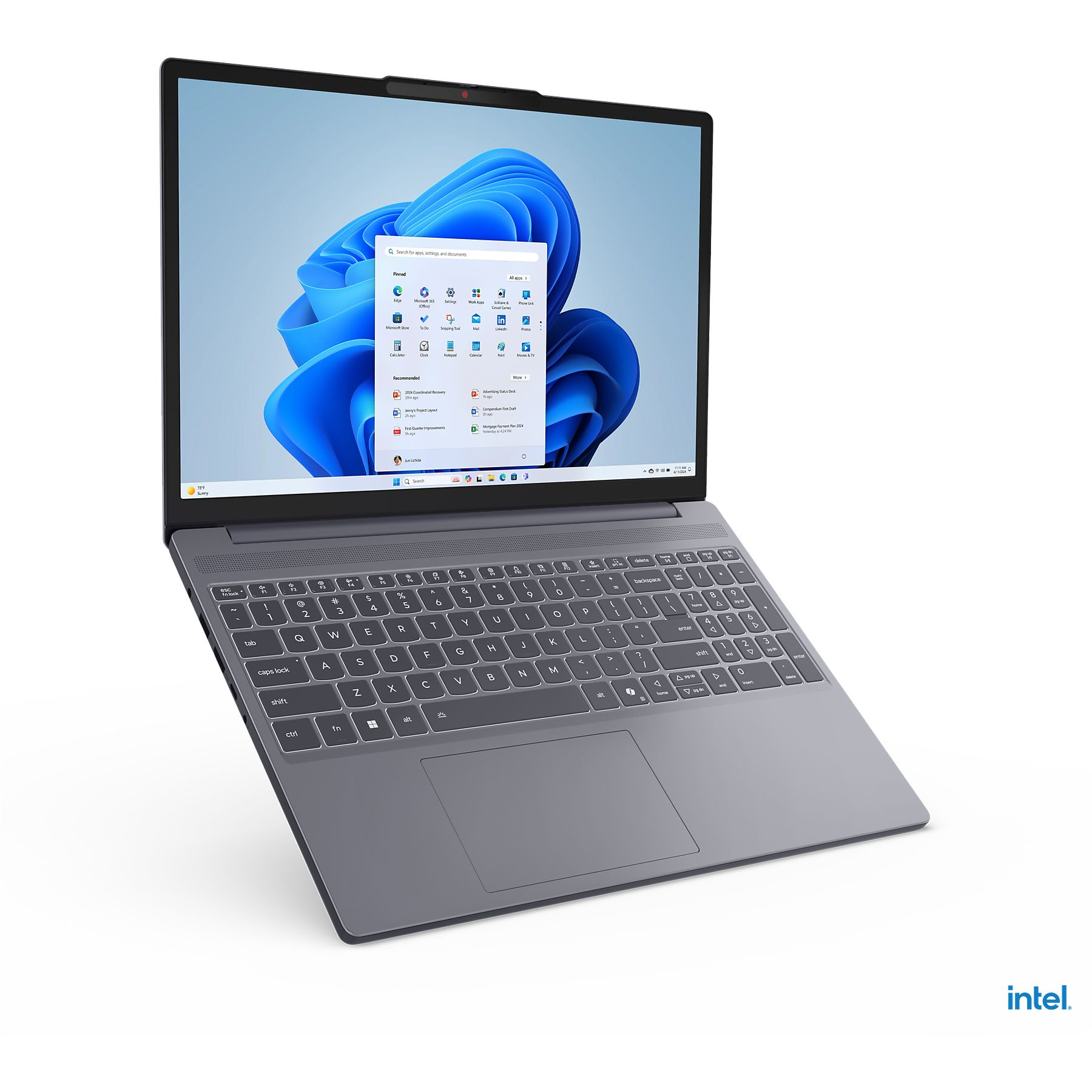 Arkadan aydınlatmalı klavyeli gri dizüstü bilgisayar ve Windows 11 başlangıç menüsü.