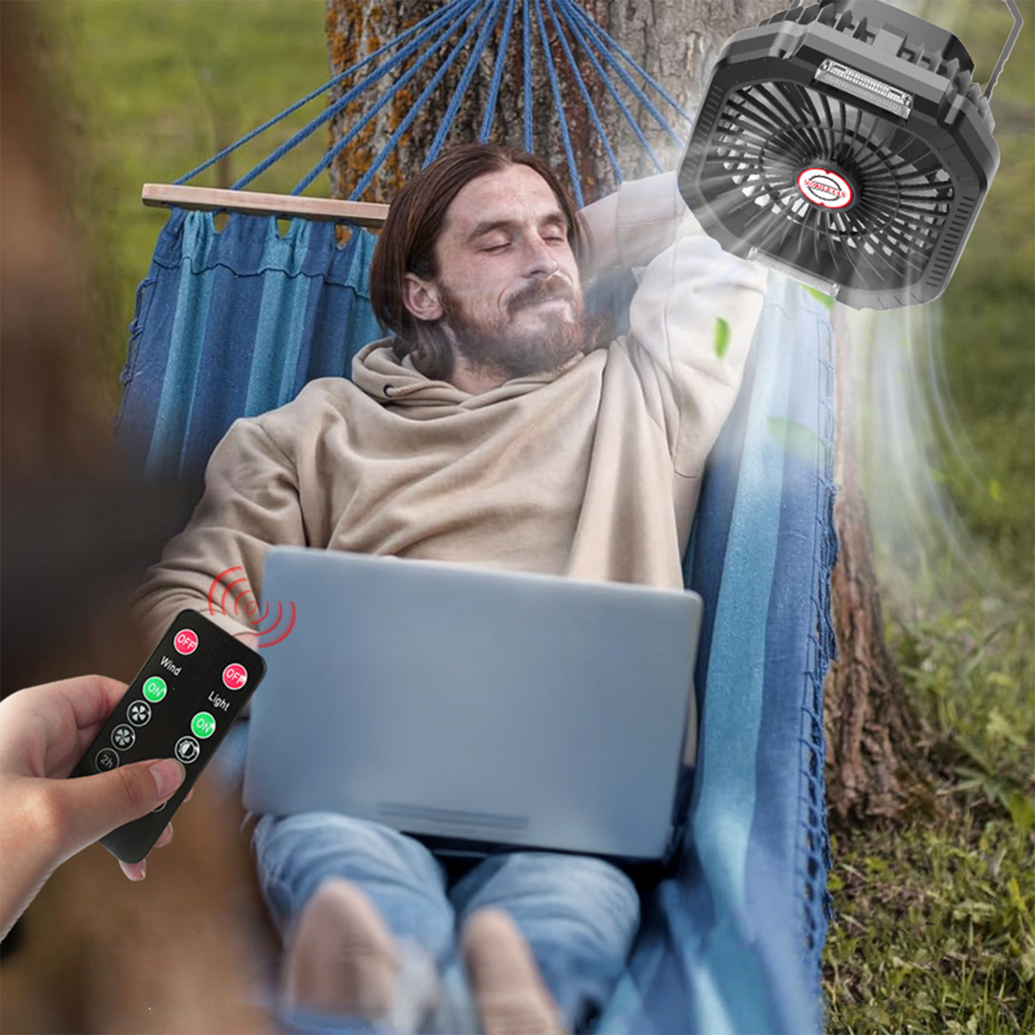 Un uomo si rilassa in un'amaca con un laptop mentre un ventilatore soffia aria.