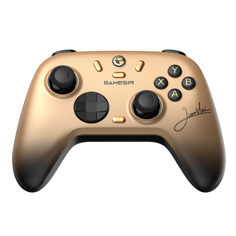 Controller da gioco dorato con pulsanti neri e una firma.