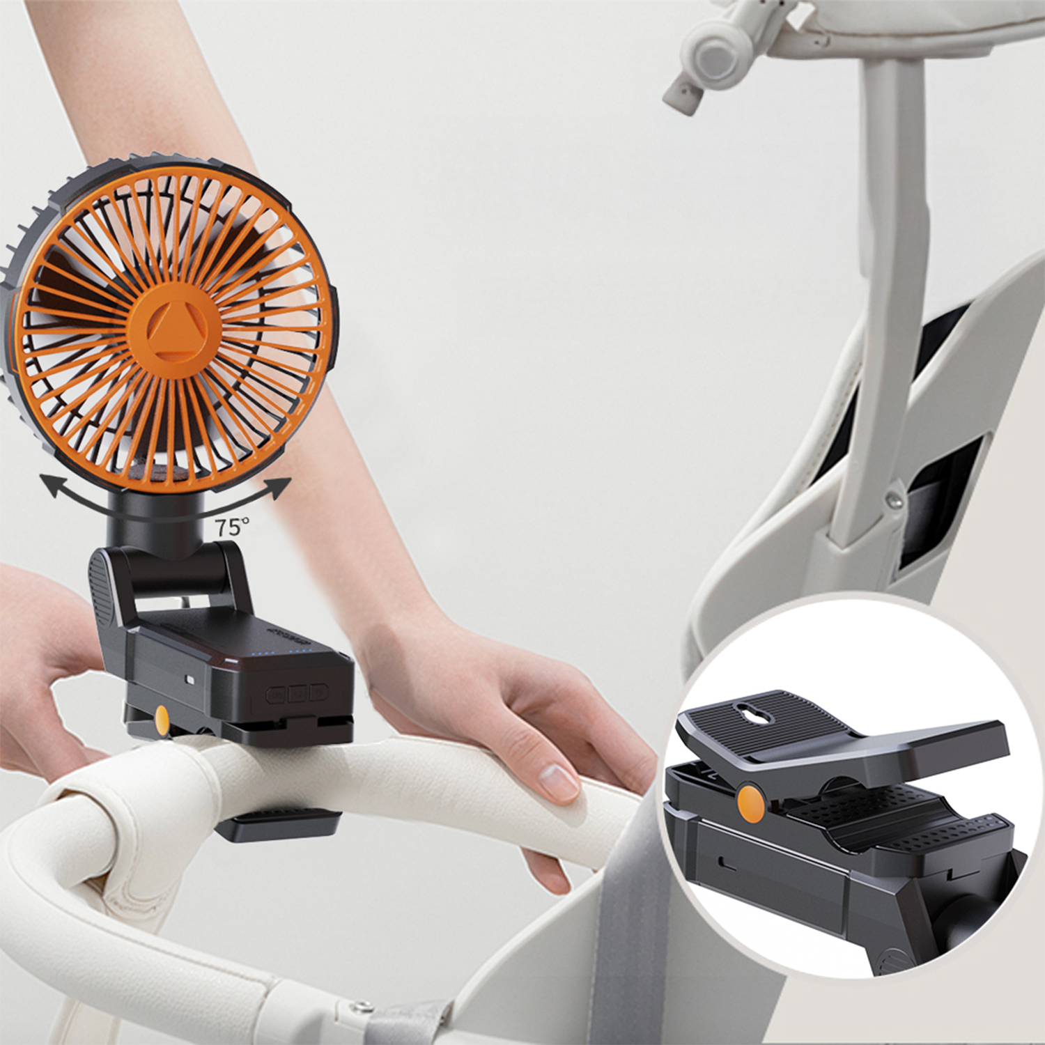 Ventilatore arancione con morsetto su passeggino, l'inserto mostra il dettaglio.