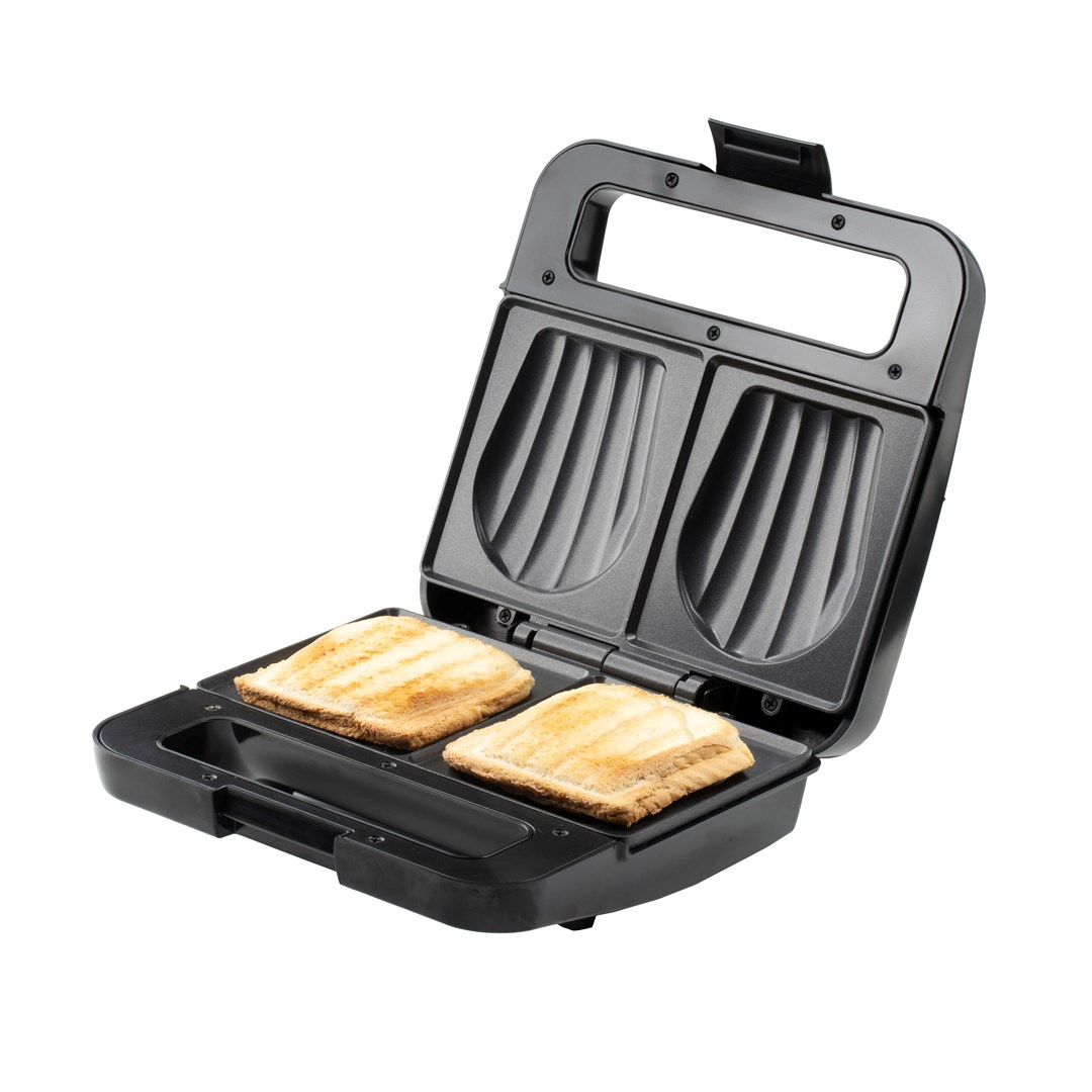 Un sandwich maker aperto con due panini dorati.