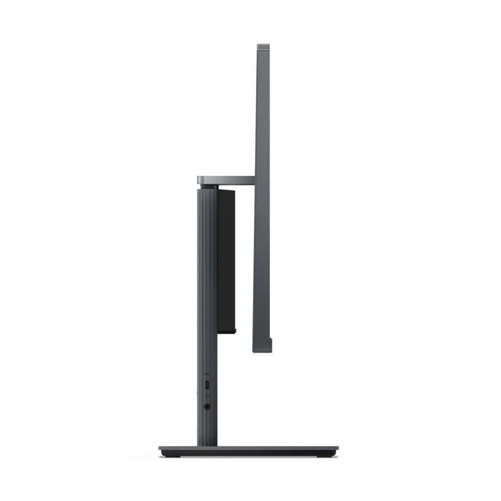 Szary monitor w profilu na białym tle.