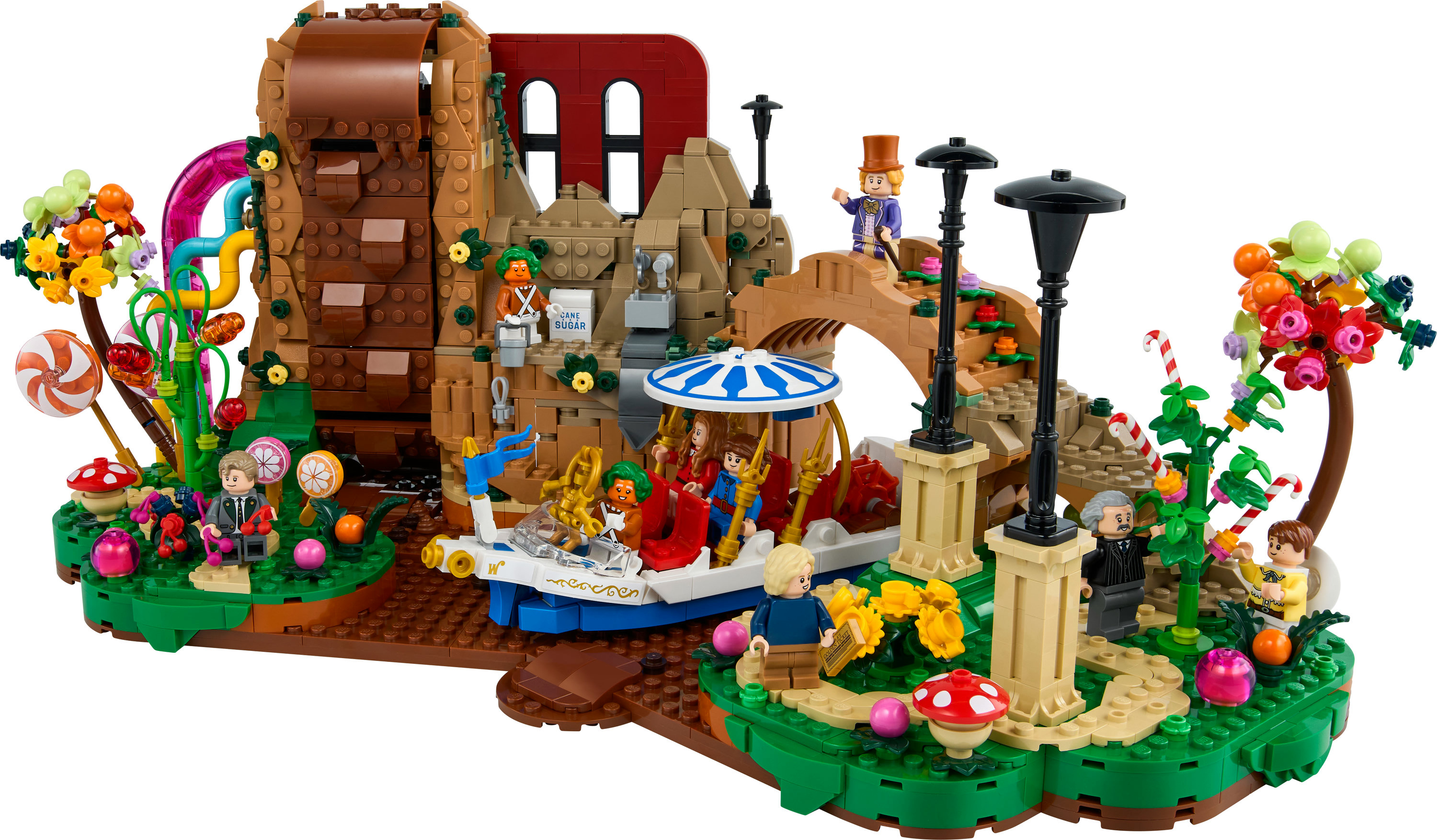 Lego-replica van een chocoladefabriek met figuren, boottocht en snoep.