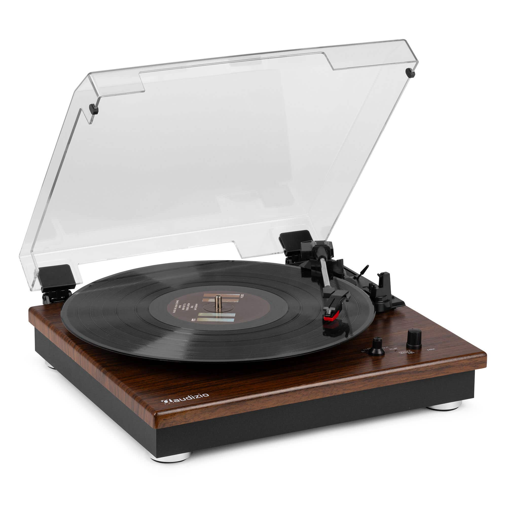 A turntable with a vinyl record, tonearm, and clear protective cover.