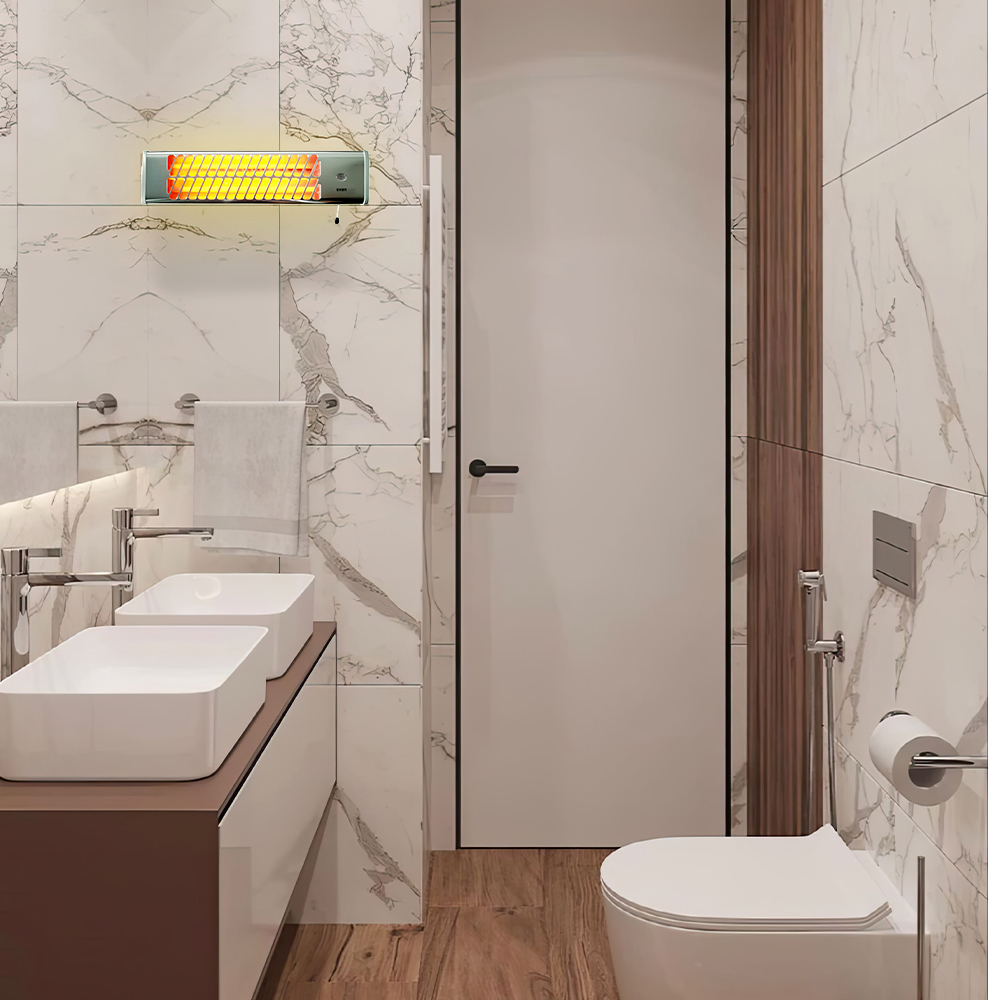 Un baño con dos lavabos, un inodoro y un calentador de pared emitiendo luz cálida.