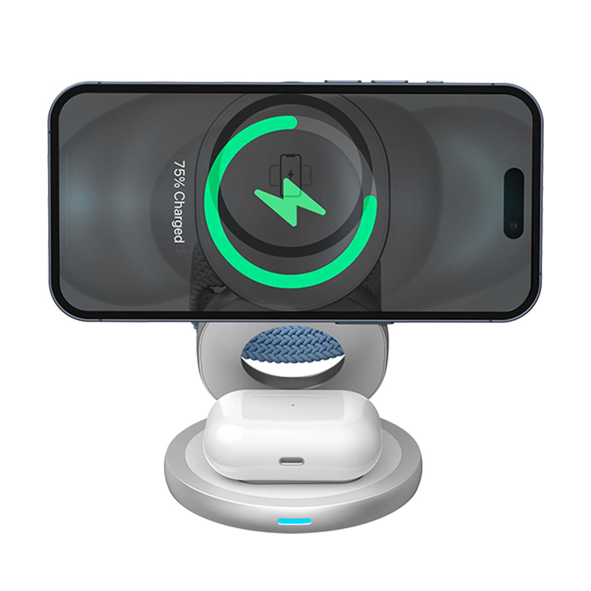 Un smartphone se está cargando en un soporte, al lado hay auriculares.