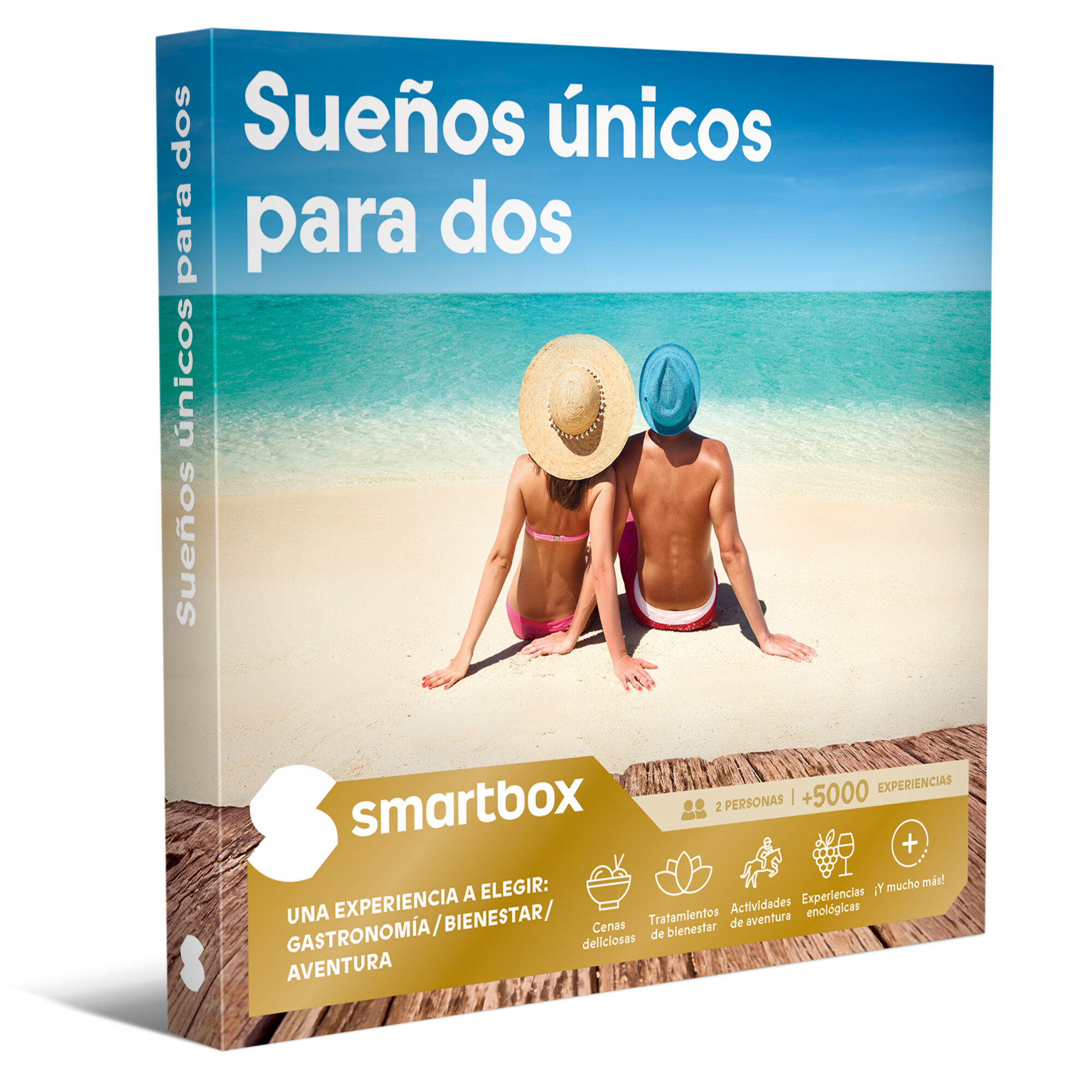 Pareja sentada en la playa, con sombreros, mirando al mar. "Sueños únicos para dos".