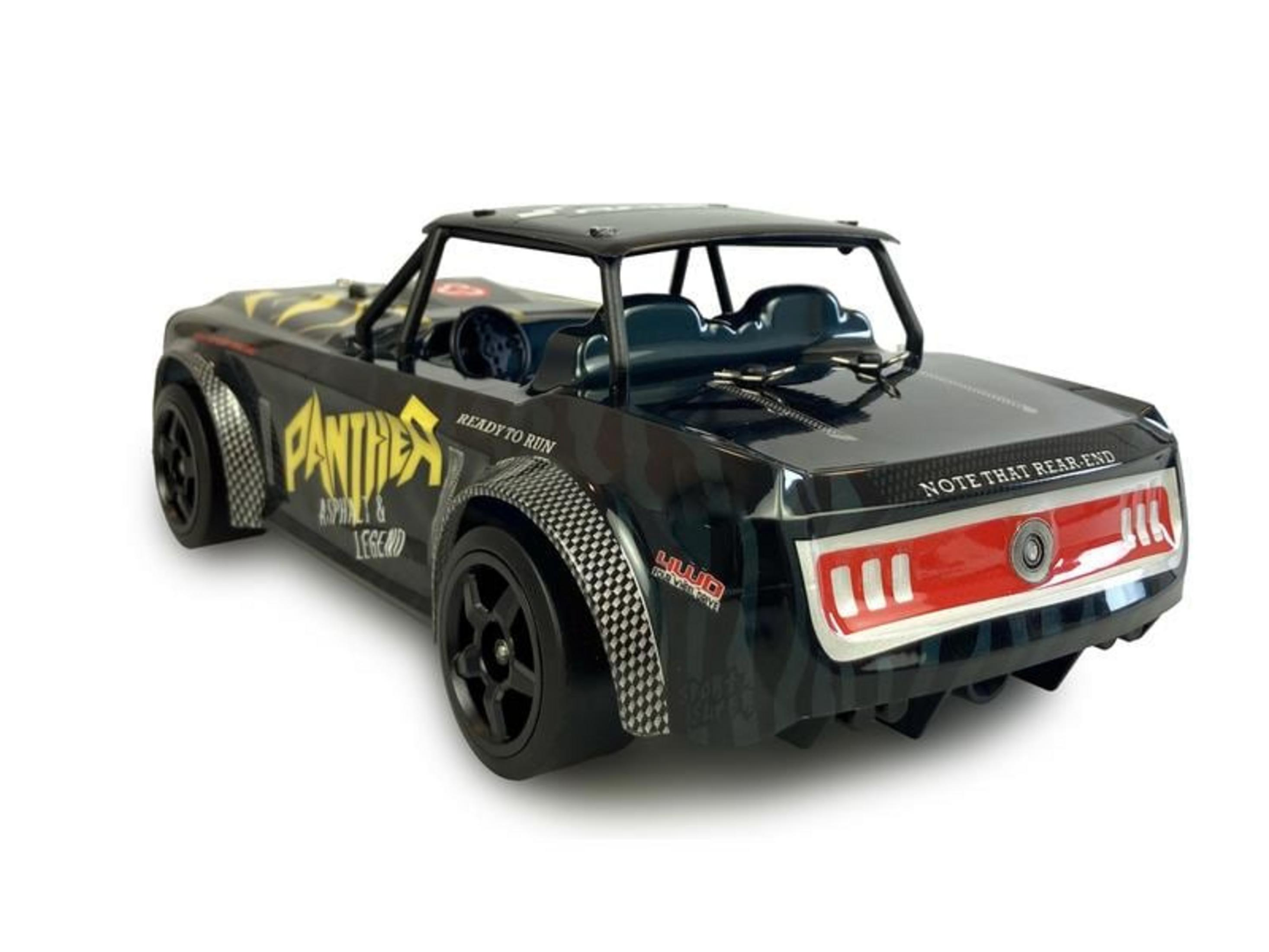 Coche de carreras RC negro con llamas amarillas, texto "Panther" y jaula antivuelco.