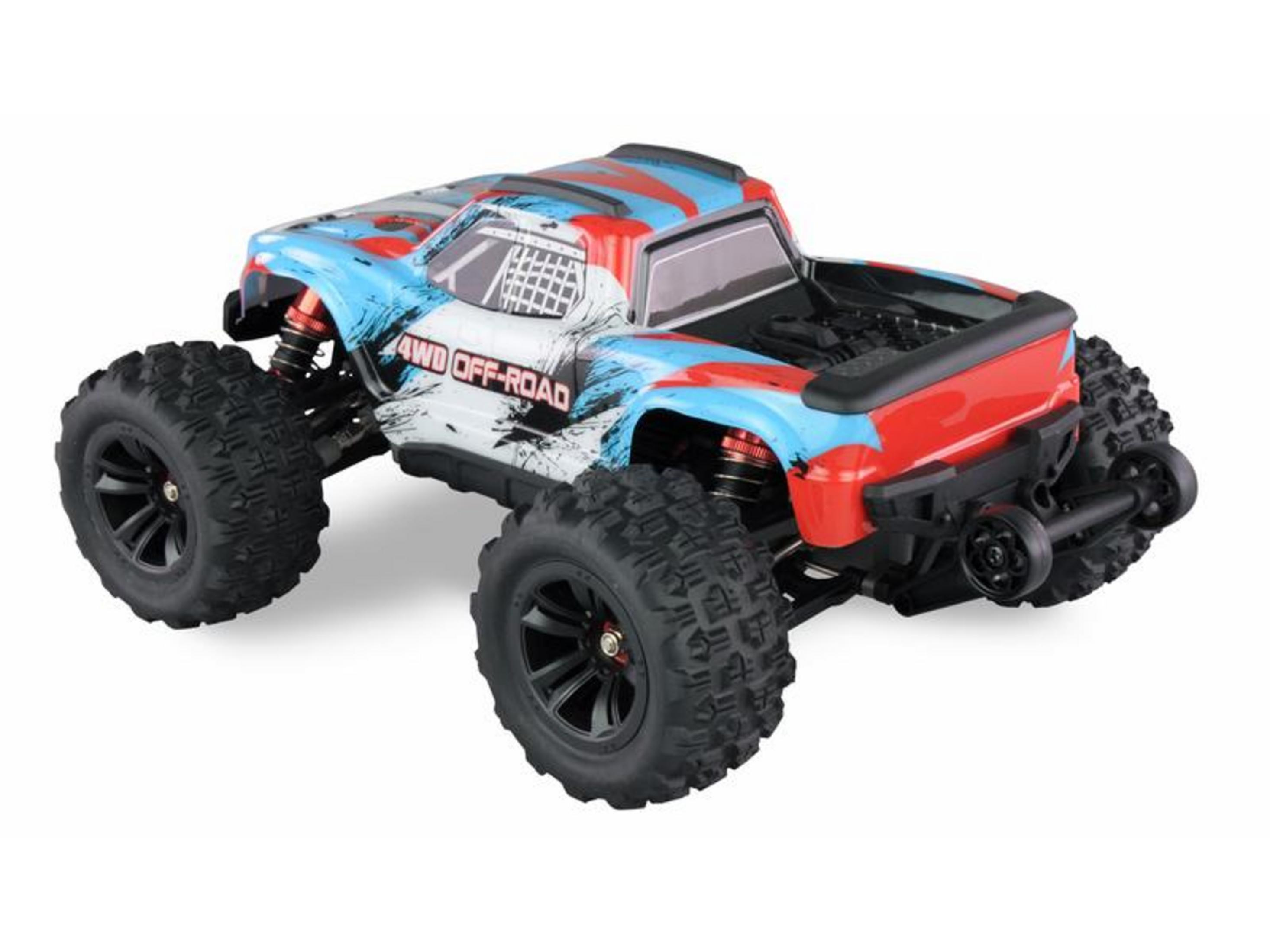 Un camión monstruo RC con diseño azul y rojo y neumáticos grandes.