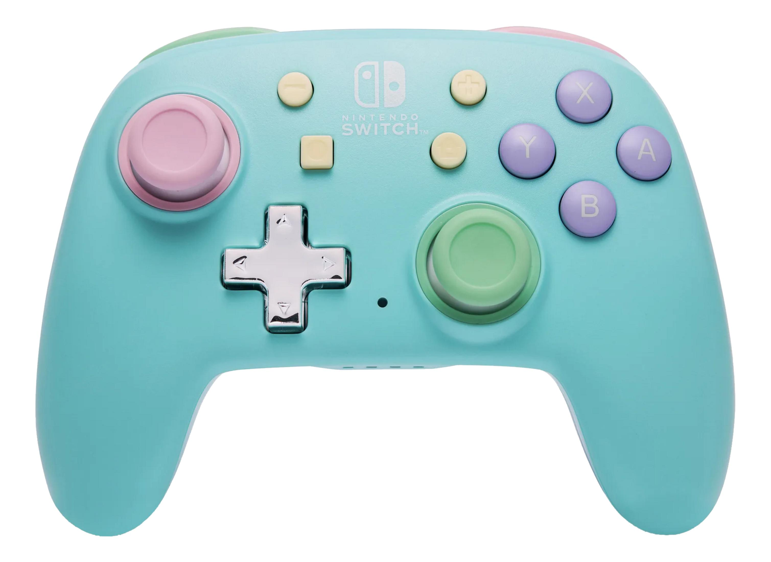 Une manette Nintendo Switch Pro turquoise avec des accents roses et verts.