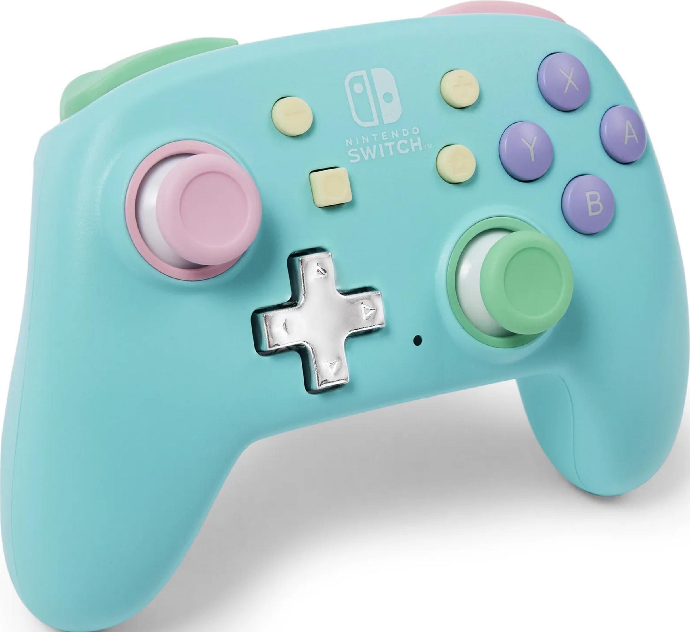 Une manette Nintendo Switch turquoise avec des boutons et joysticks pastel.