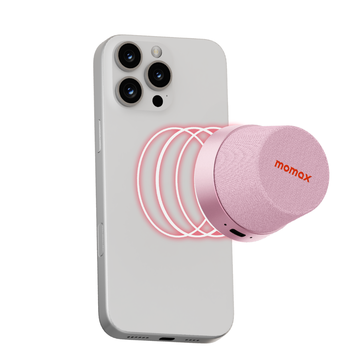 Pembe bir MOMAX hoparlör, beyaz bir iPhone'a manyetik olarak yapışır.