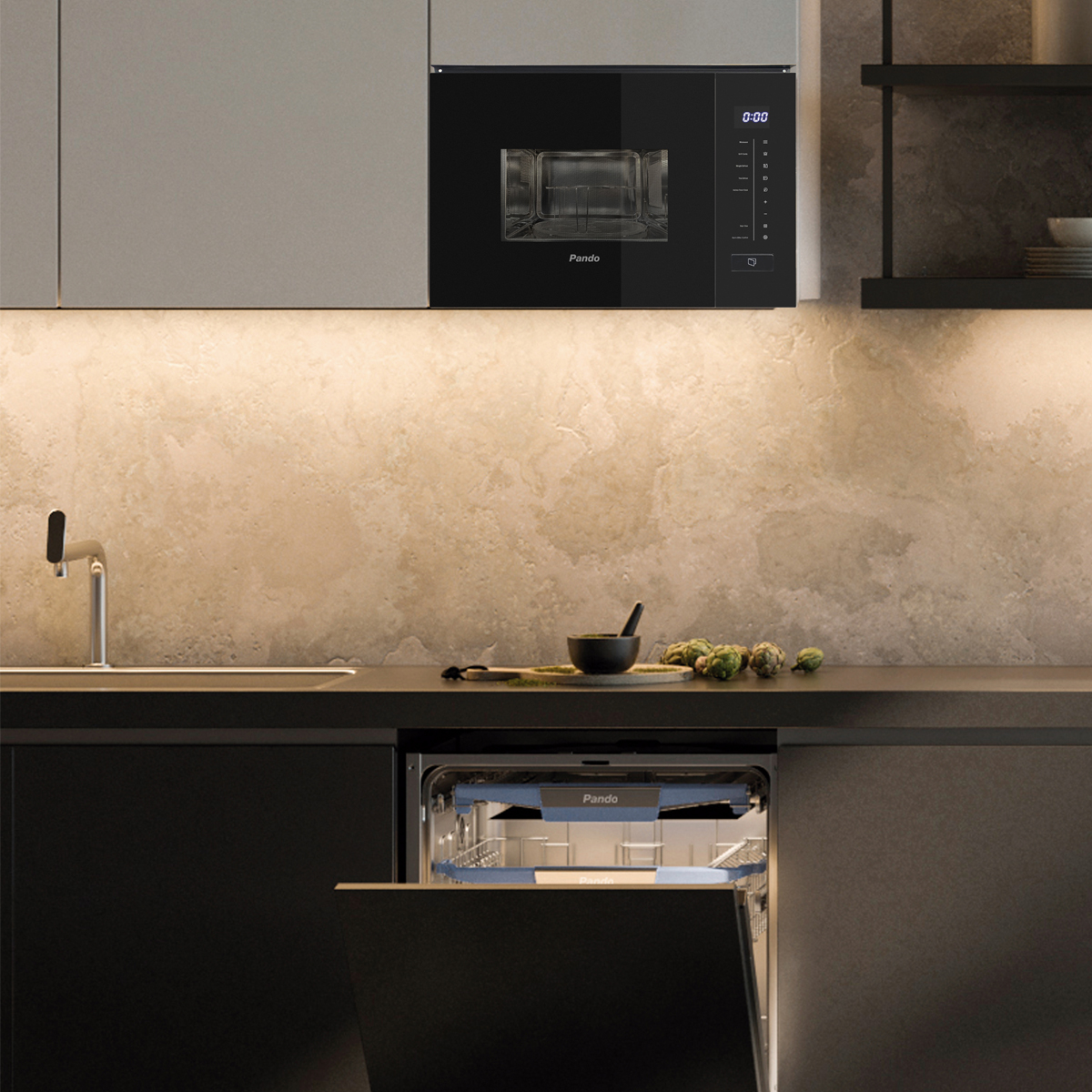 Cocina moderna con microondas, lavavajillas y encimera con bol.