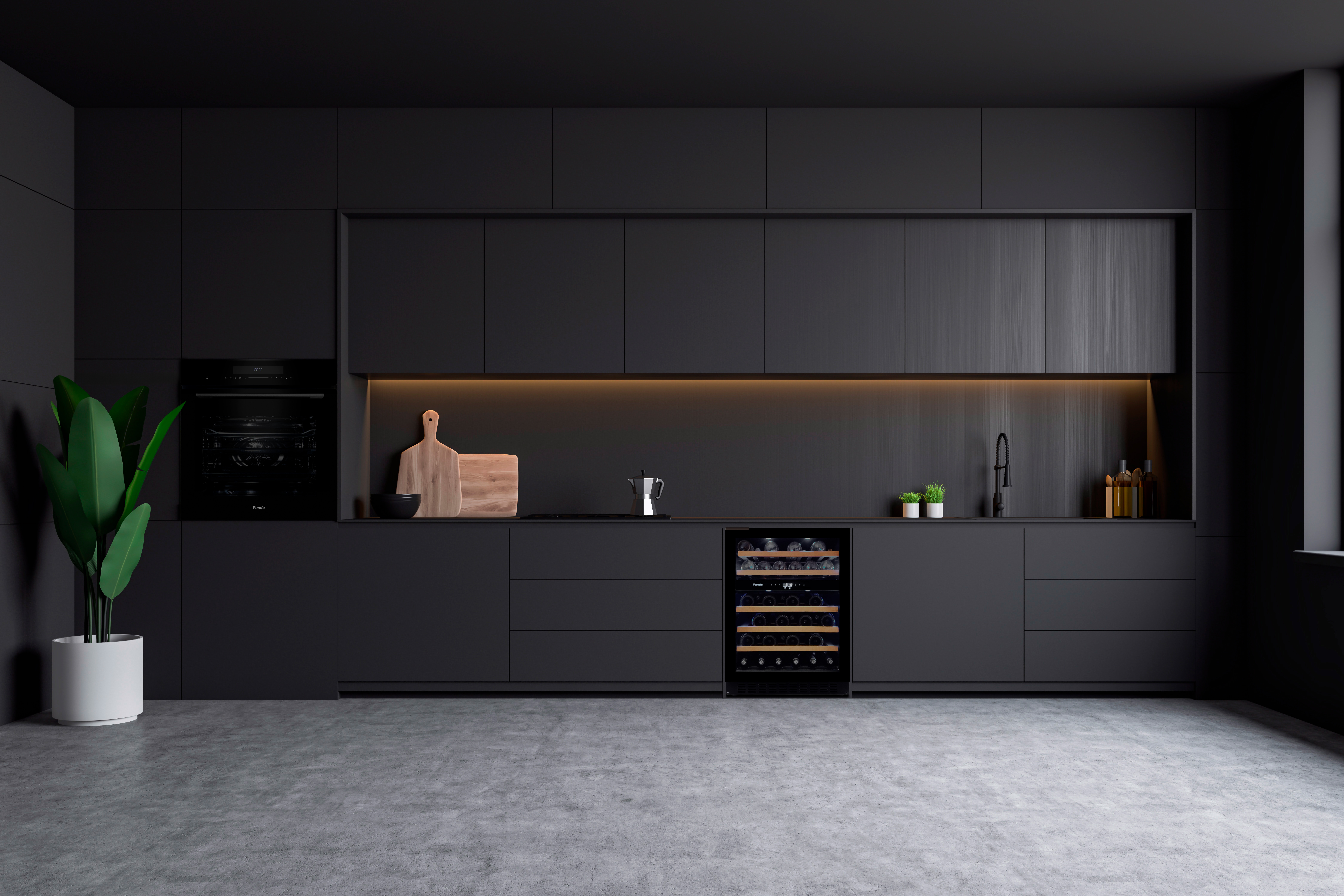 Moderna cocina negra con electrodomésticos empotrados, enfriador de vino y una planta verde grande.