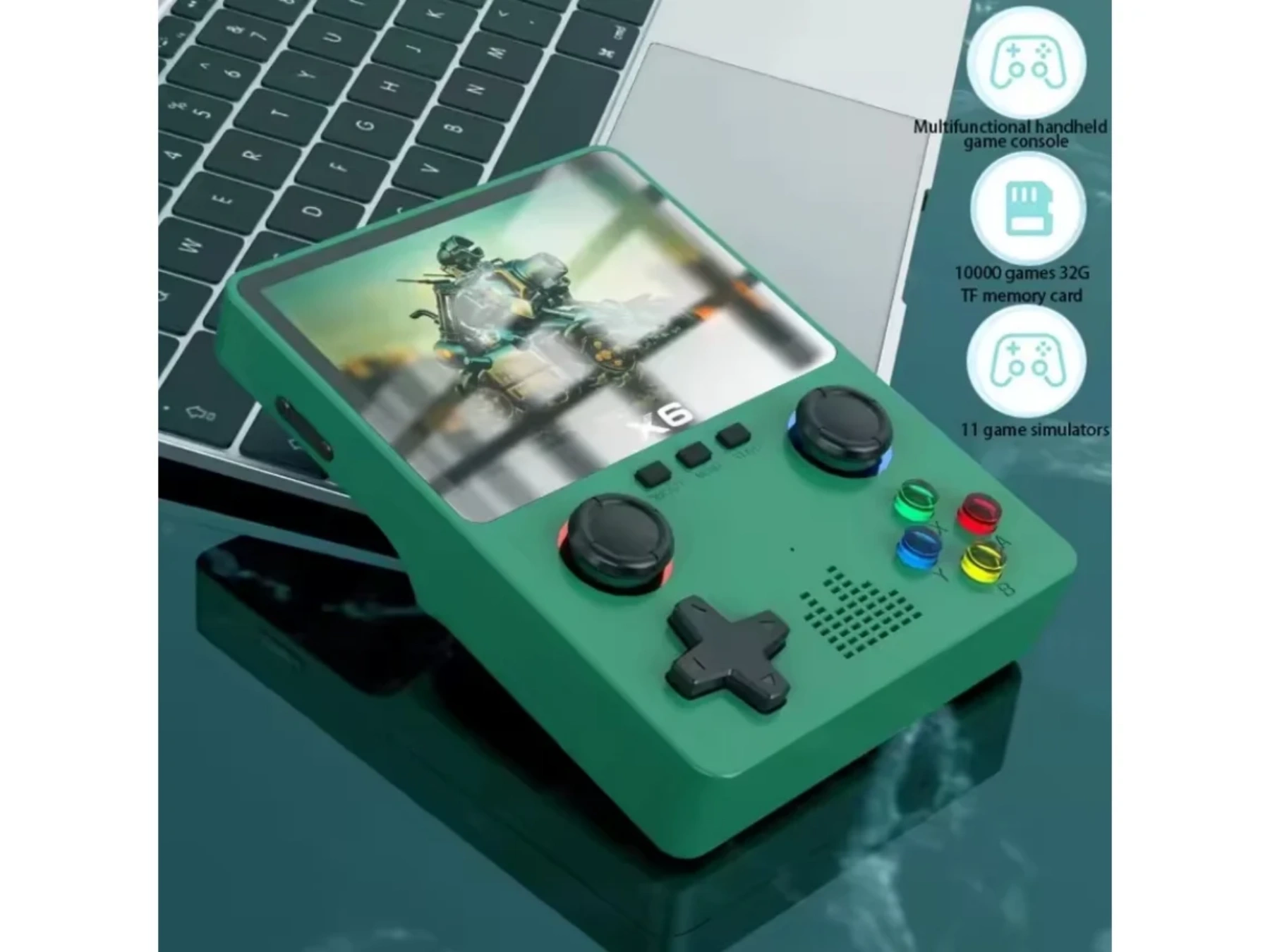 Ein grünes Handheld-Spielgerät mit Bildschirm, Tasten und Joystick auf einer Tastatur.