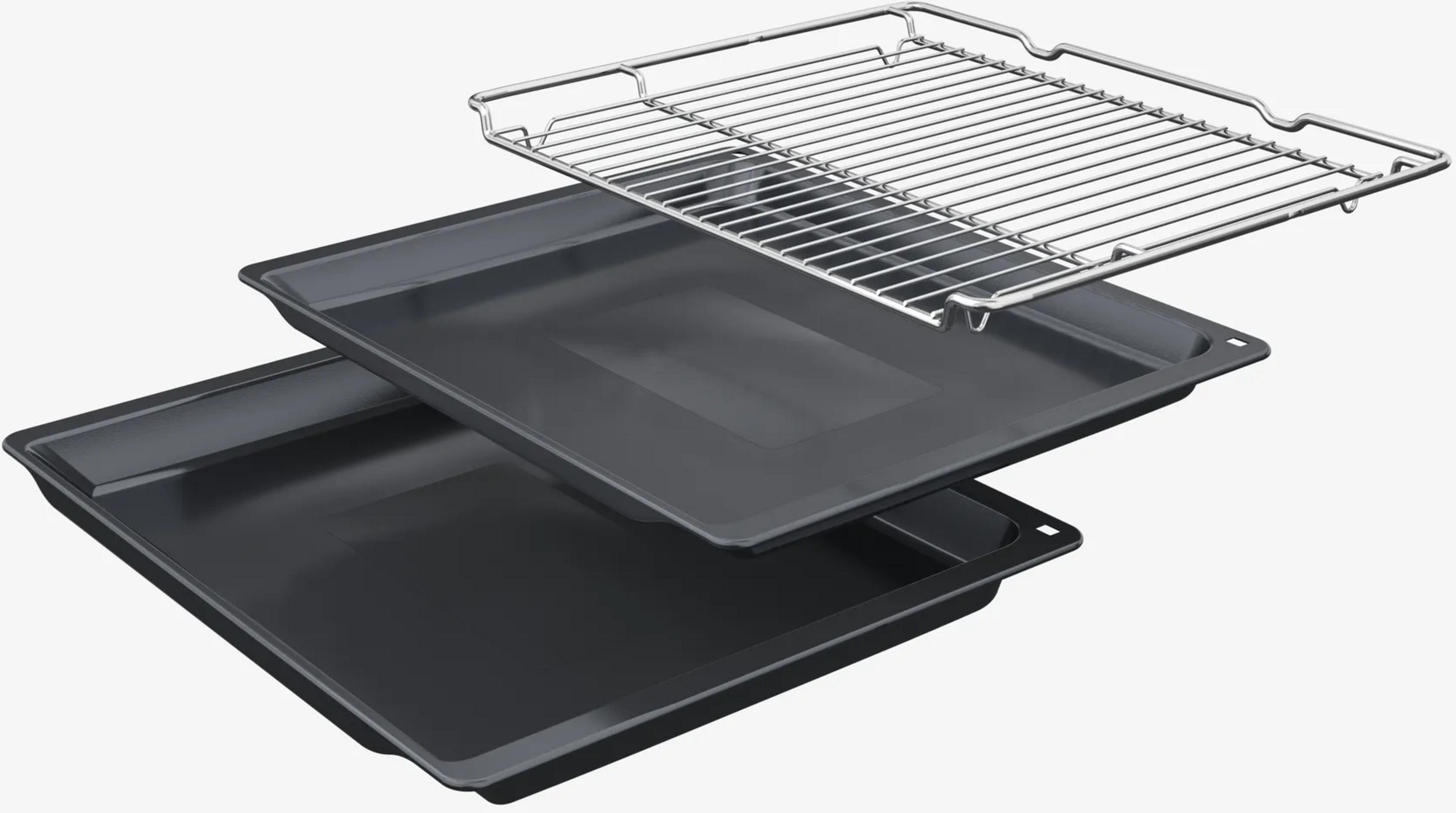 Une grille métallique repose sur deux plaques de cuisson noires empilées.