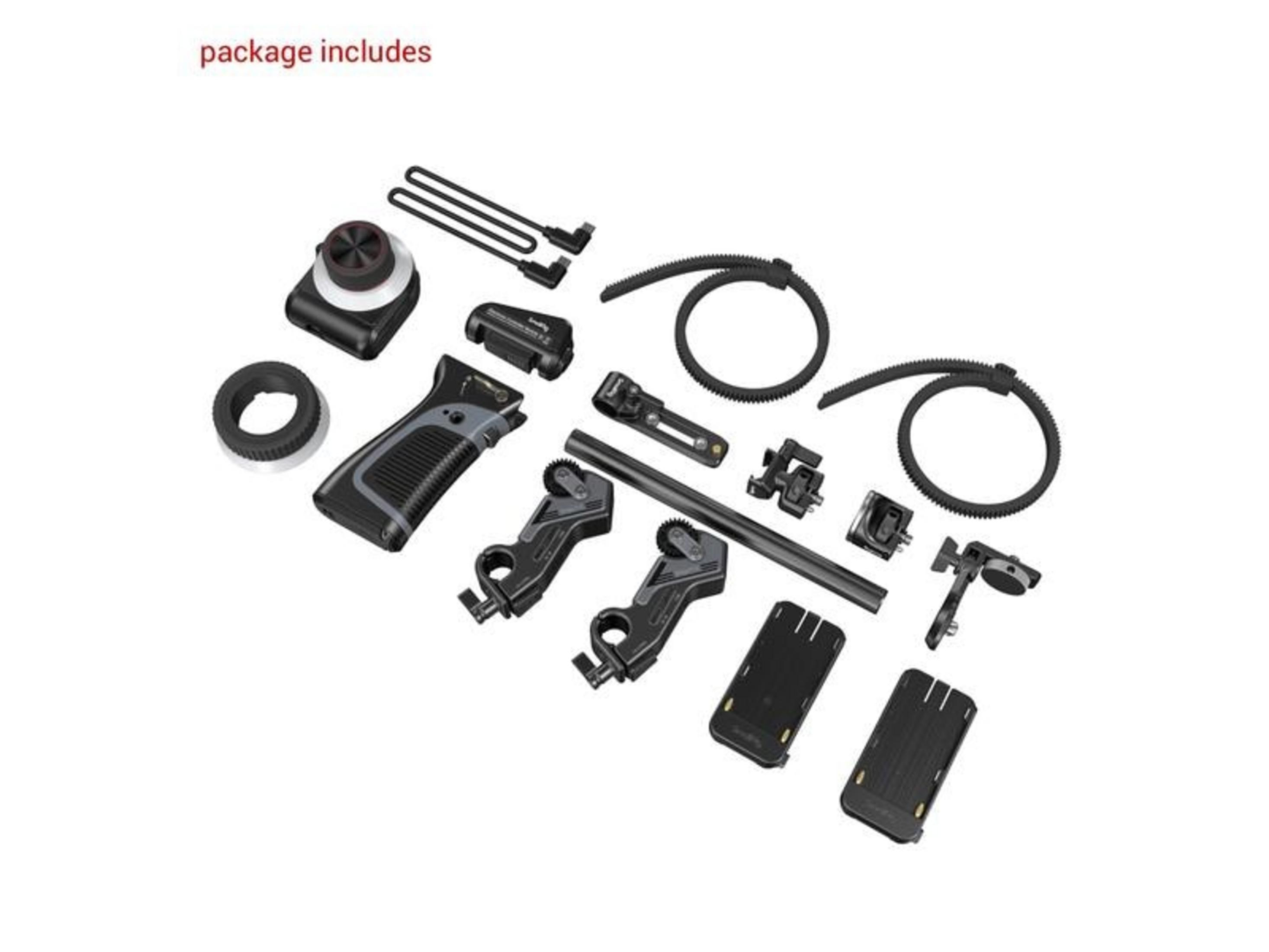 Paket enthält Kamerazubehör: Griff, Kabel, Klemmen und Akkus.