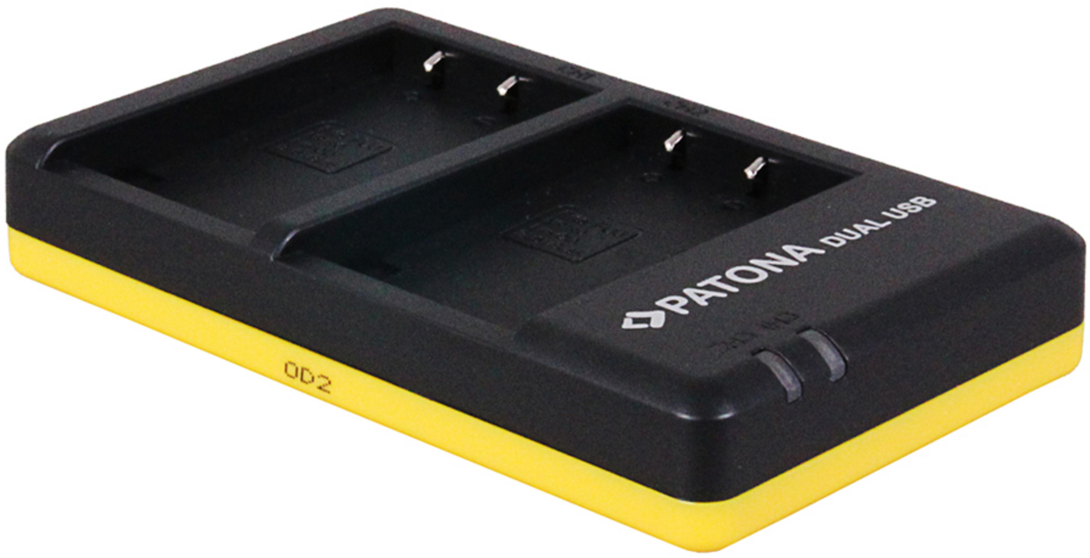 Un caricabatterie doppio USB nero con base gialla.