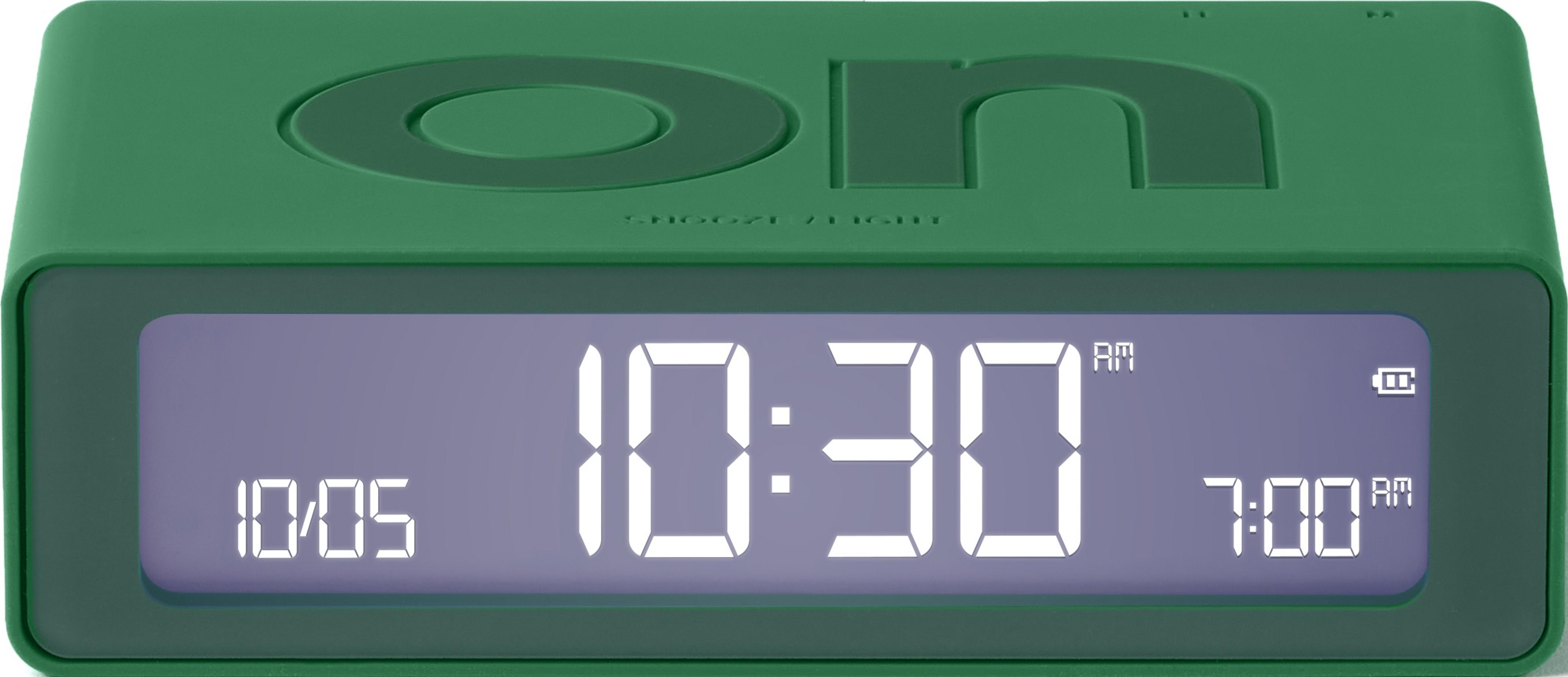 Un réveil numérique vert affiche 10:05 et 10:30.