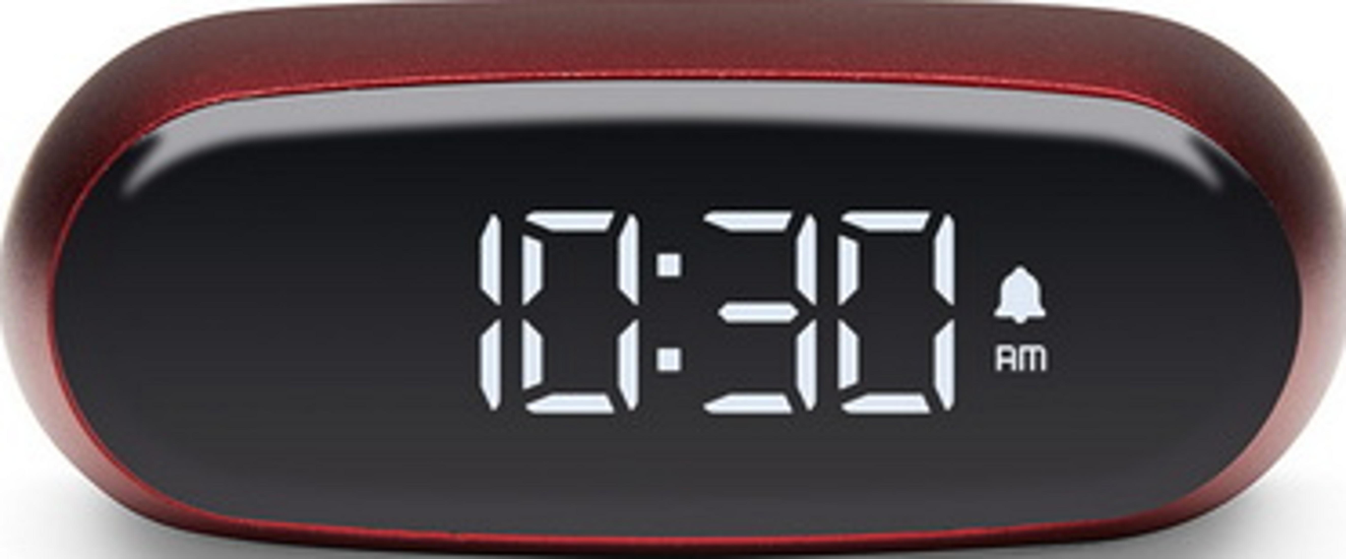 Ein roter Digitalwecker zeigt 10:30 AM mit einem Glockensymbol an.
