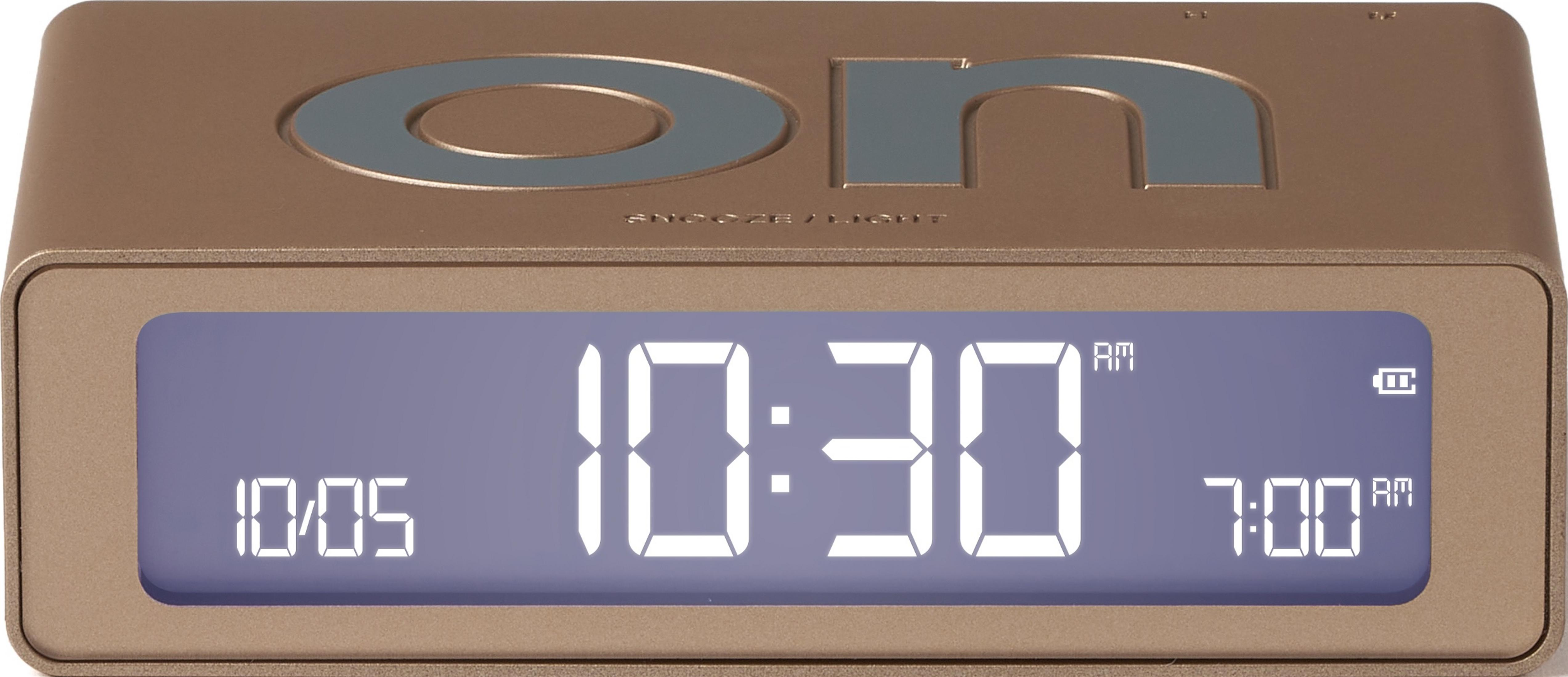 Goldener Digitalwecker zeigt 10:30 Uhr und 7:00 Uhr an.