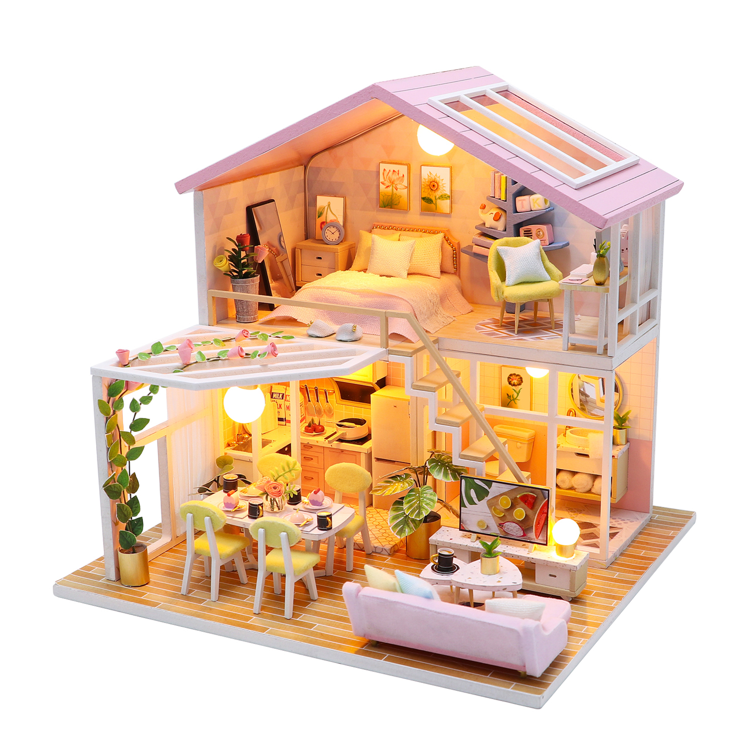 Una casa delle bambole rosa a due piani, con camera da letto, cucina e soggiorno.