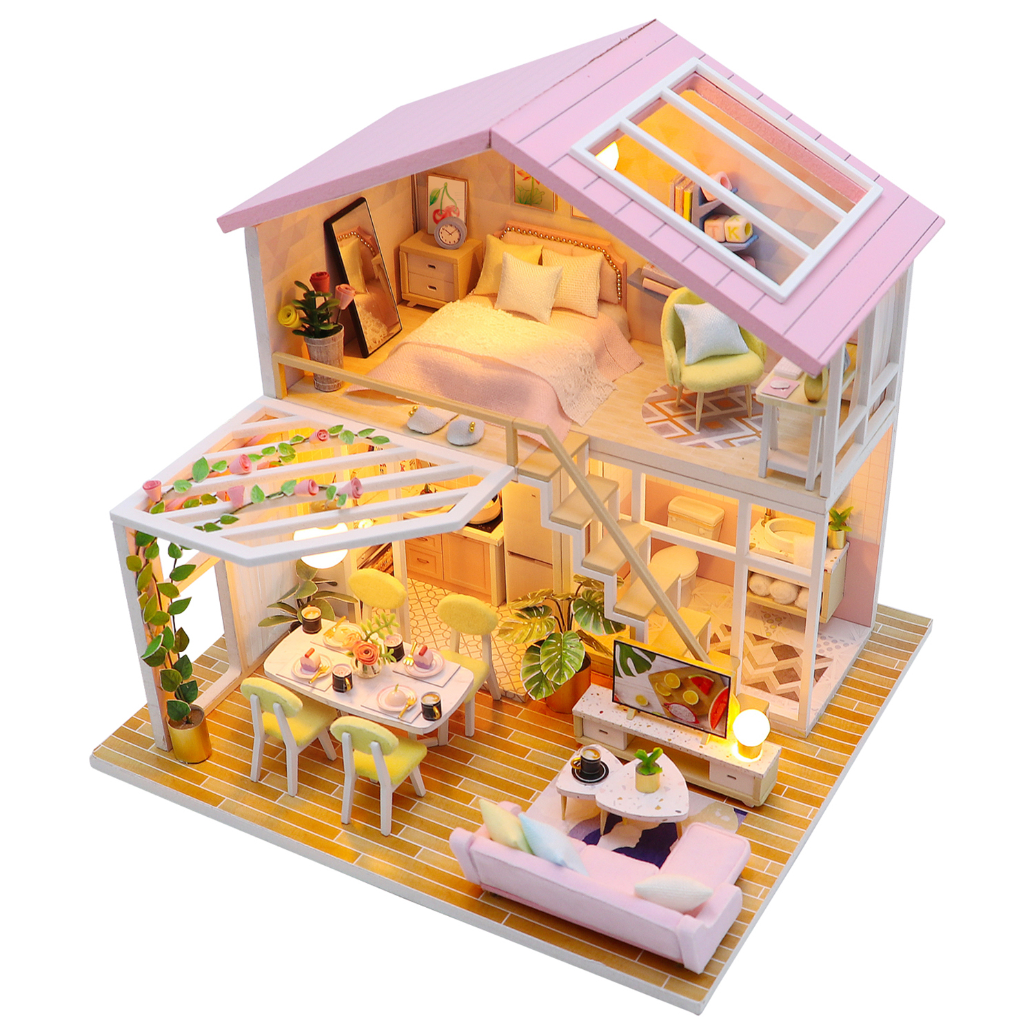 Casa in miniatura con tetto rosa, con camera da letto, sala da pranzo, soggiorno e bagno.