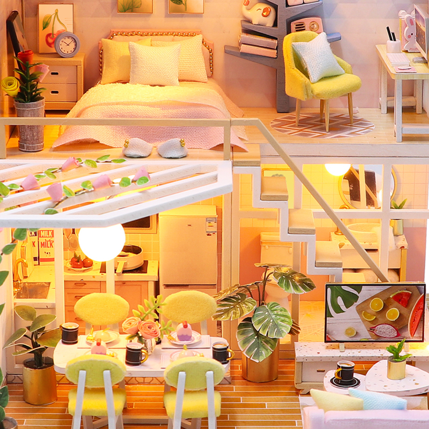 Casa in miniatura con camera da letto, cucina e soggiorno, dettagliata e illuminata.