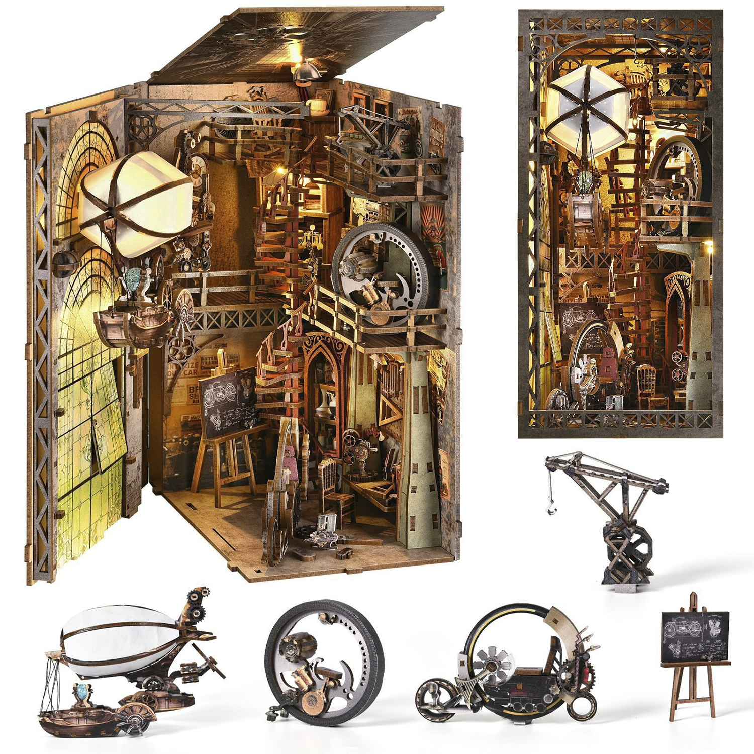 Modelli steampunk in miniatura: casa, dirigibile, gru, bicicletta e cavalletto.