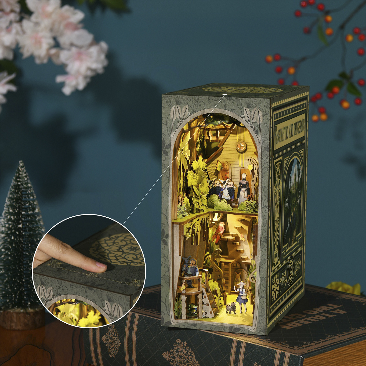 Un diorama di libro dettagliato con figure e luci, che raffigura una scena.