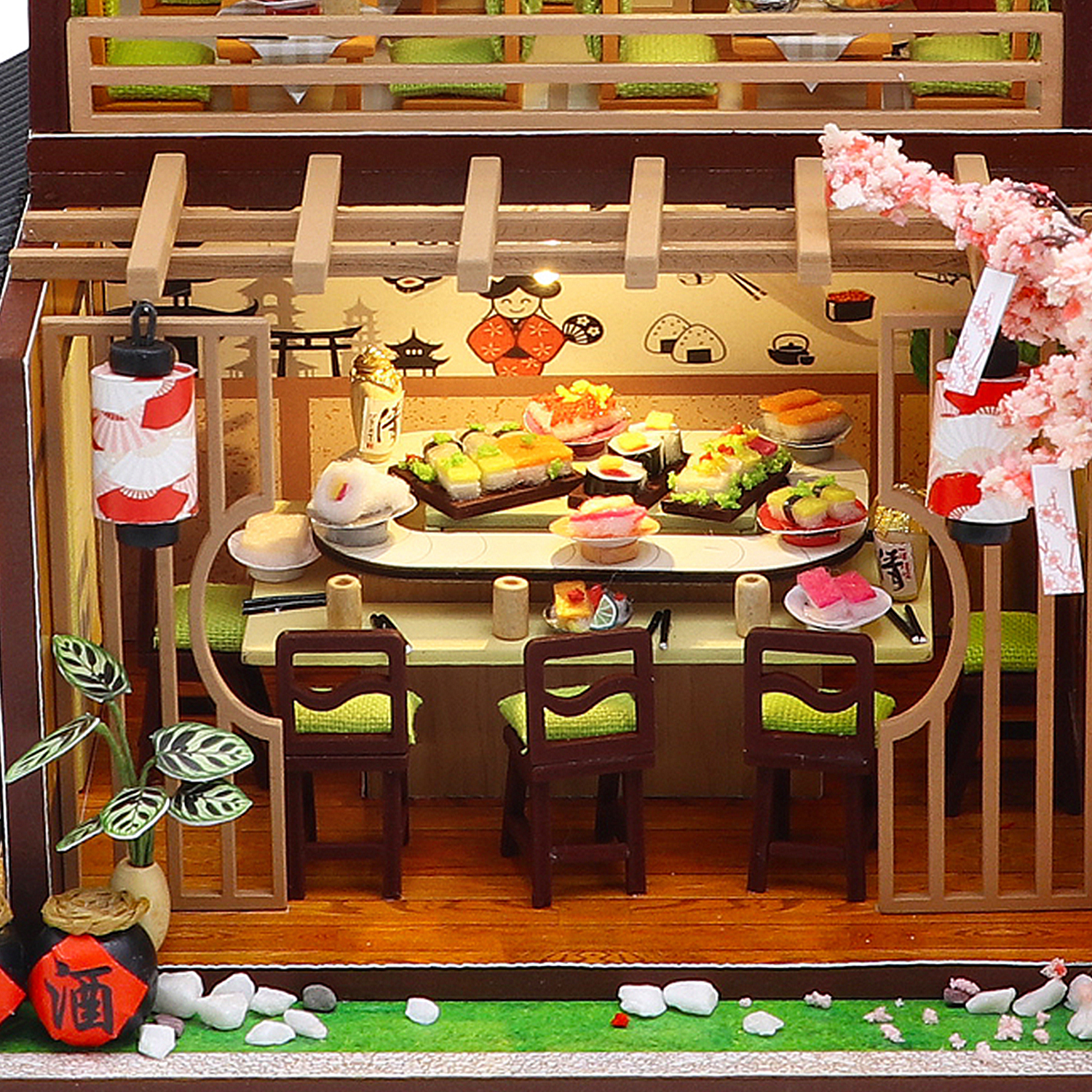 Mini ristorante con sushi e posti a sedere.