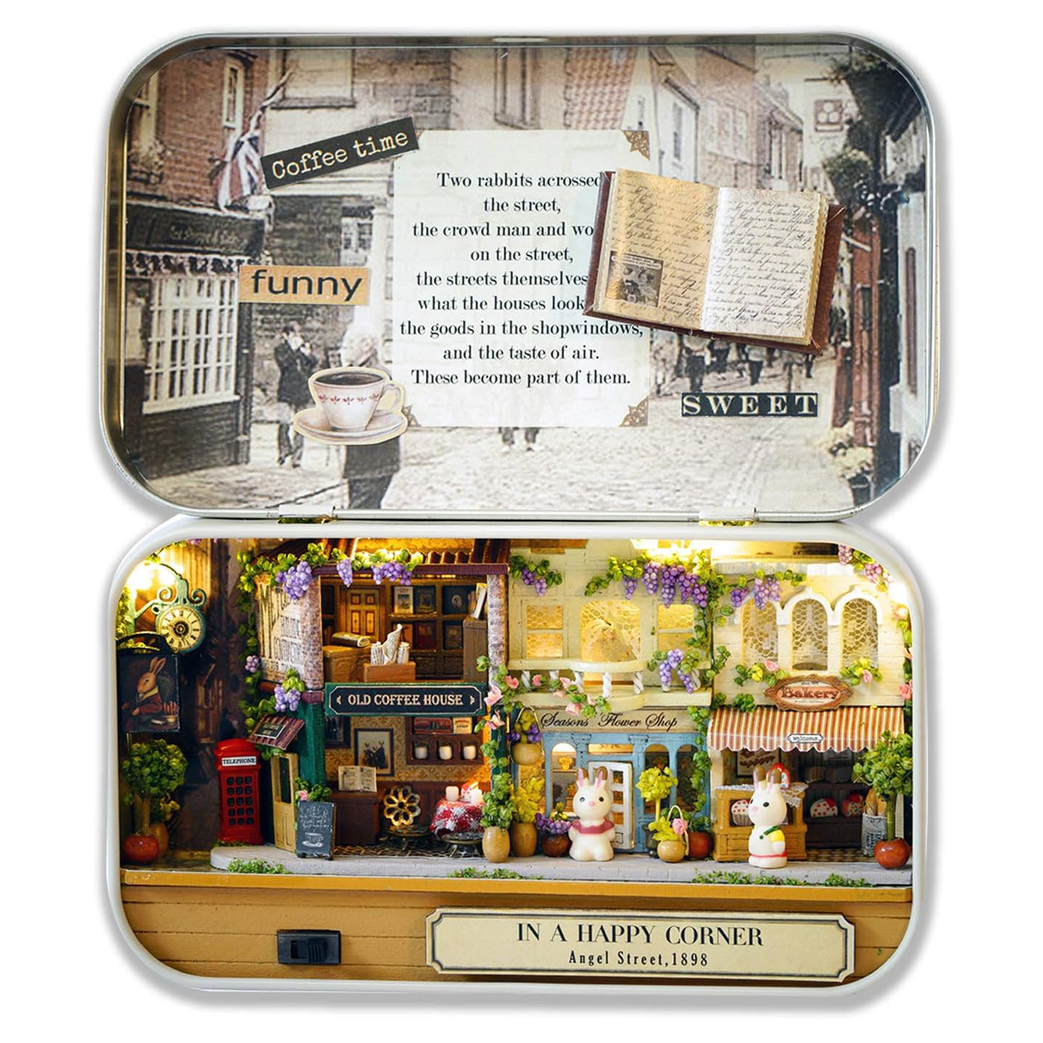 Un diorama con scena di strada, caffè e fiorista con figure di conigli.