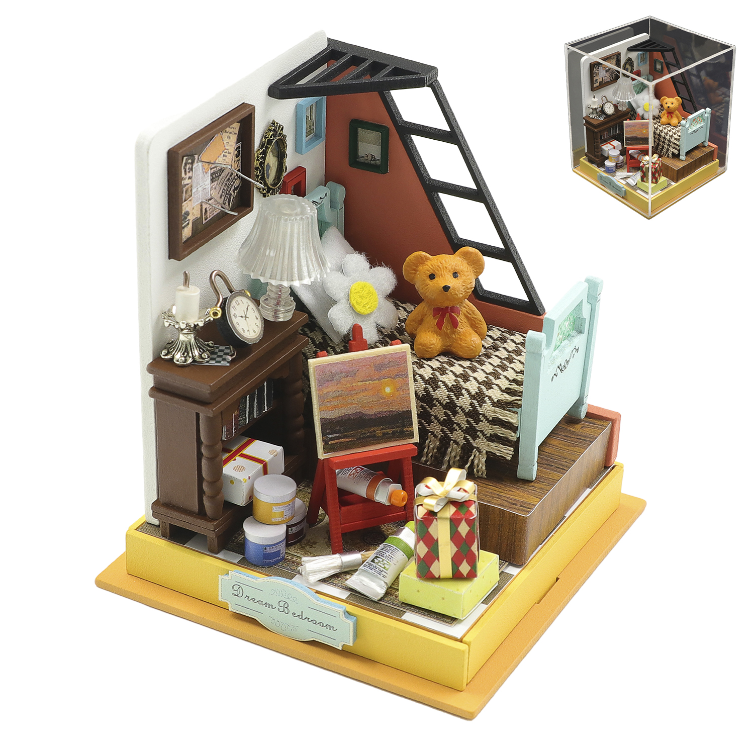 Miniatura di una camera da letto con orsacchiotto, letto, cavalletto e colori.